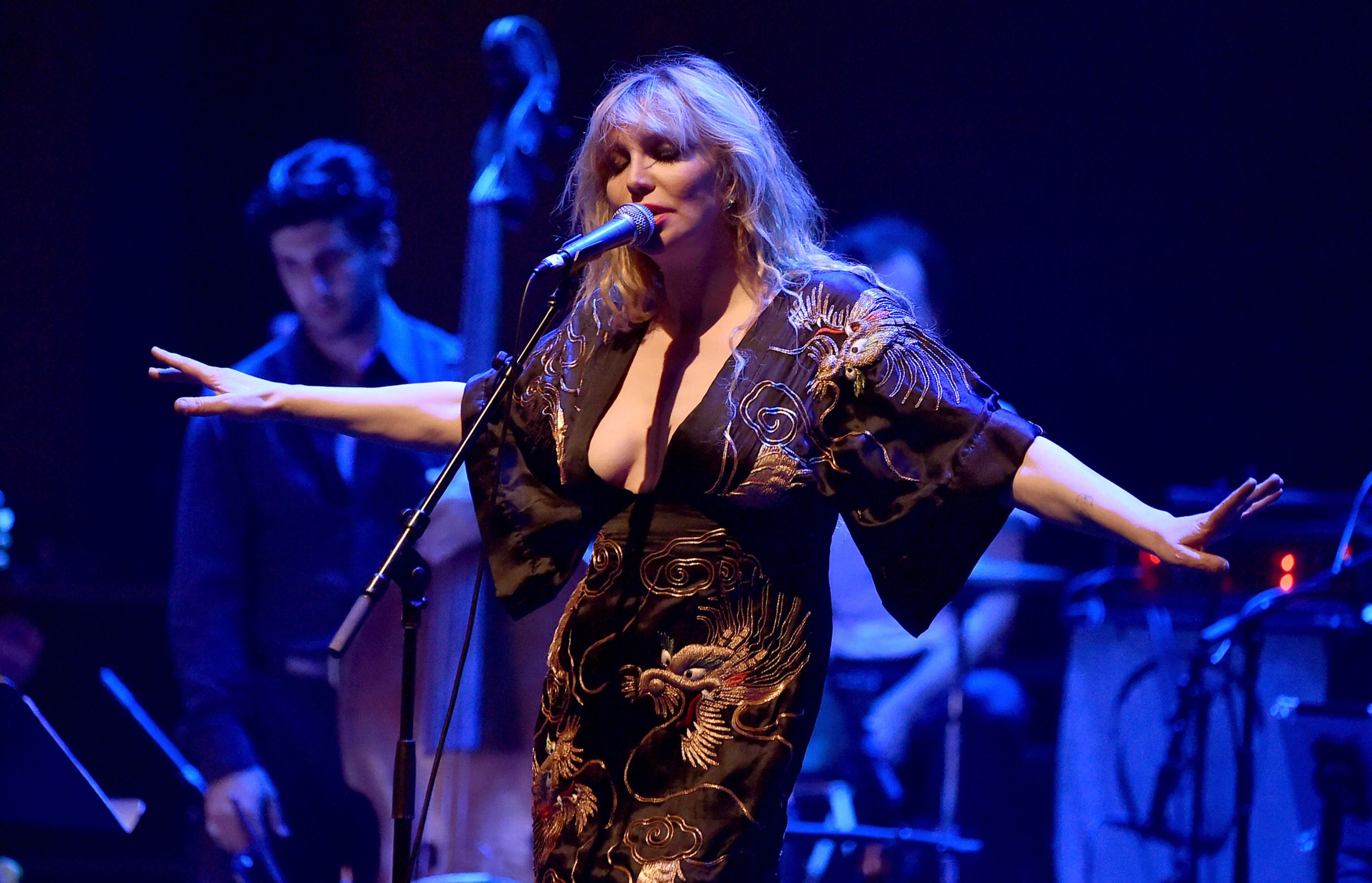 LOS ANGELES, CA - APRIL 07: Musician Courtney Love performs onstage during The David Lynch Foundation's DLF Live Celebration of the 60th Anniversary of Allen Ginsberg's "HOWL" with Music, Words, and Funny People at The Theatre at Ace Hotel on April 7, 2015 in Los Angeles, California. (Photo by Kevin Winter/Getty Images)