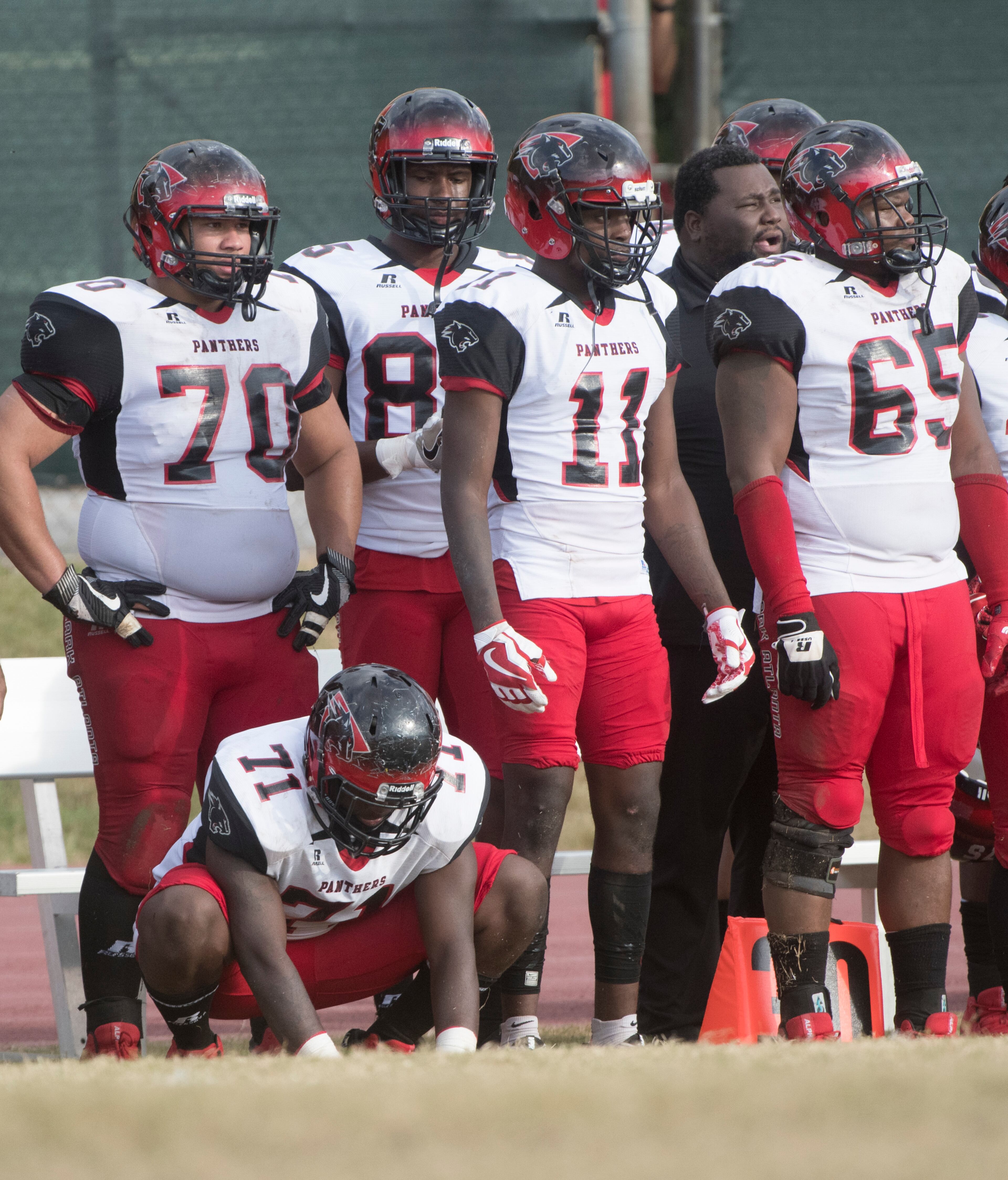 Clark Atlanta players watch from the sideline during the closing minutes of a college football game against Morehouse on Saturday, Nov. 4, 2017, in Atlanta. Morehouse won 40-0. (John Amis)