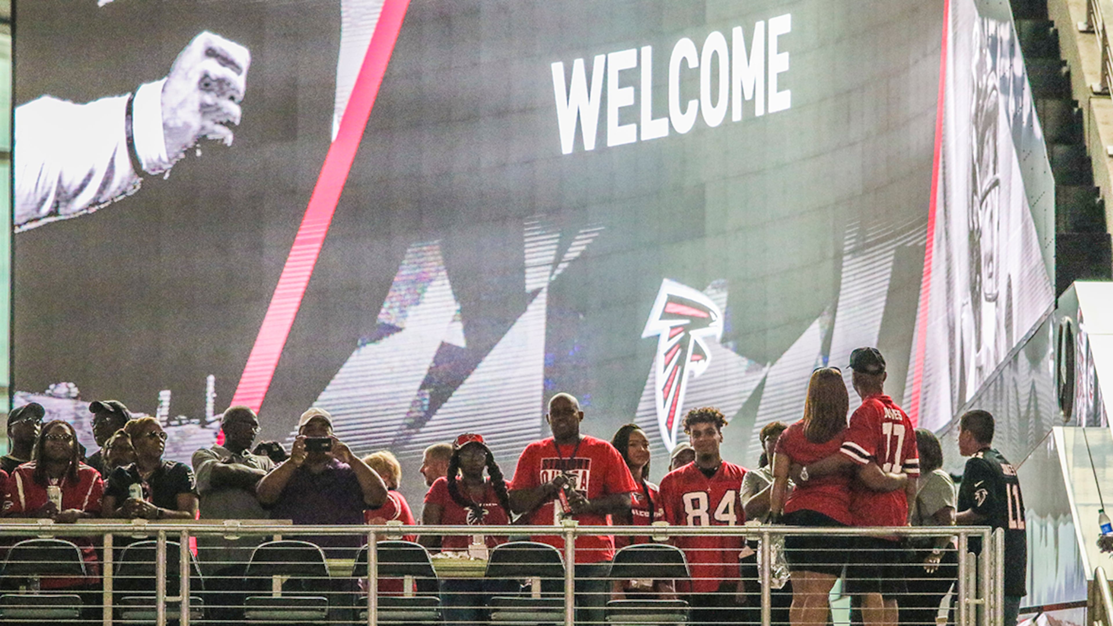 Fans capture their first memories of Mercedes-Benz Stadium Saturday, Aug. 26, 2017, before the opening game, an exhibition against the Arizona Cardinals in Atlanta.