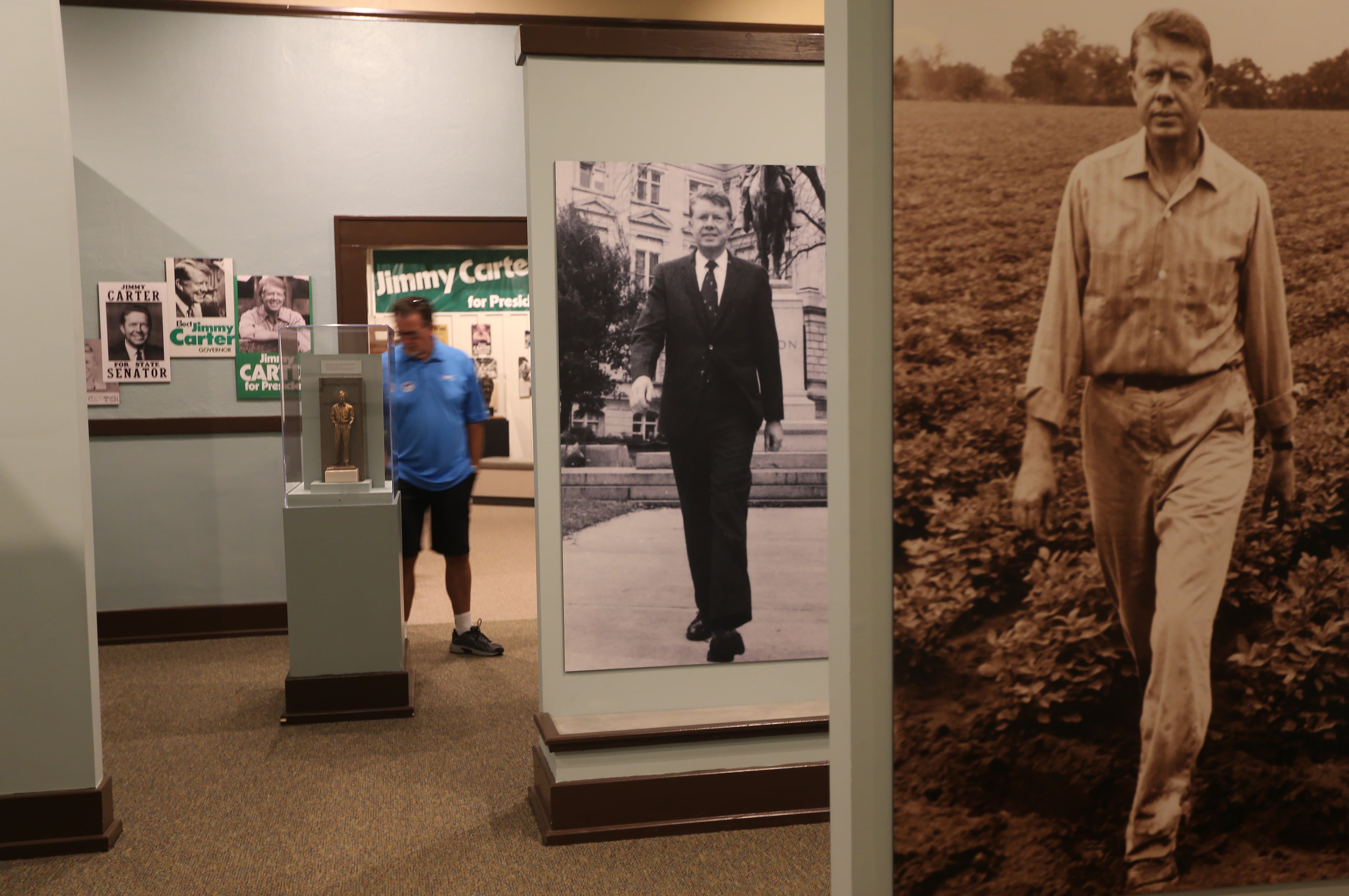 Cliff Stayton browses the displays at the Plains High School Museum and Visitor Center after riding the train into Plains for the day Saturday August 15, 2015.