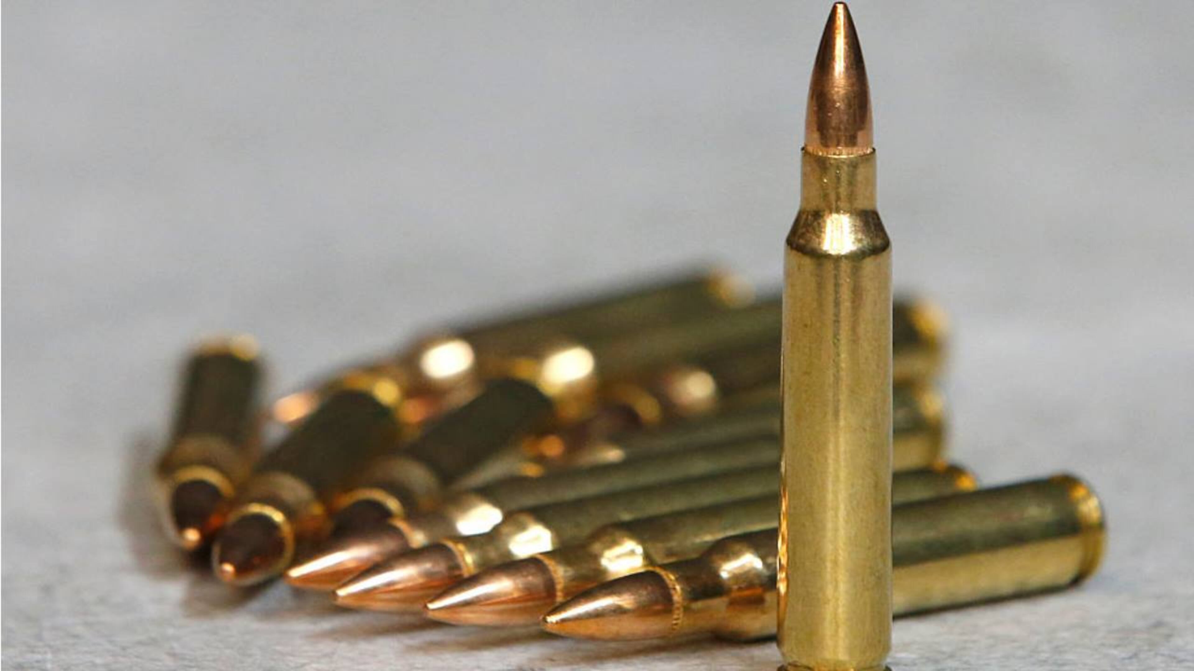 A North Carolina woman exchanged fire with a man who was breaking into her home Wednesday, police said.