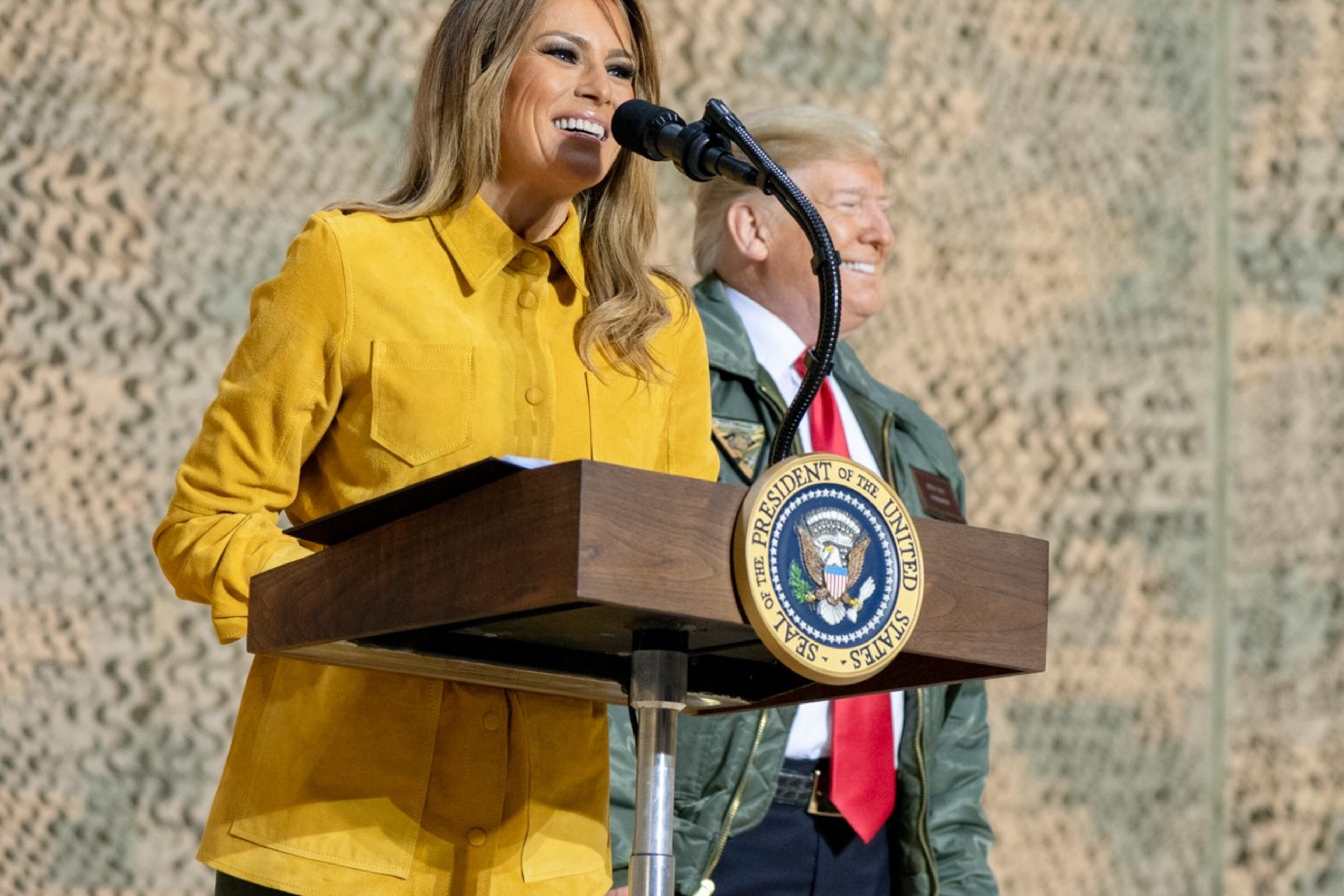 First Lady Melania Trump, joined by President Donald J. Trump, addresses her remarks to U.S. troops Wednesday, December 26, 2018, at the Al-Asad Airbase in Iraq.