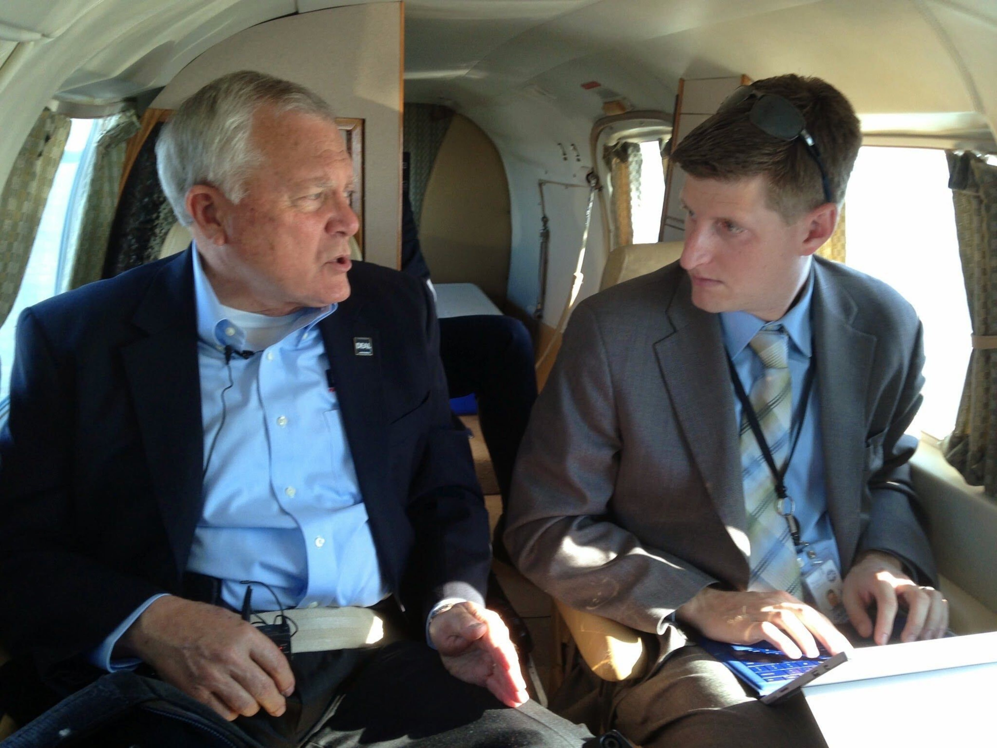 Gov. Nathan Deal answers questions from AJC political reporter Greg Bluestein aboard a small plane in 2014. (AJC file)