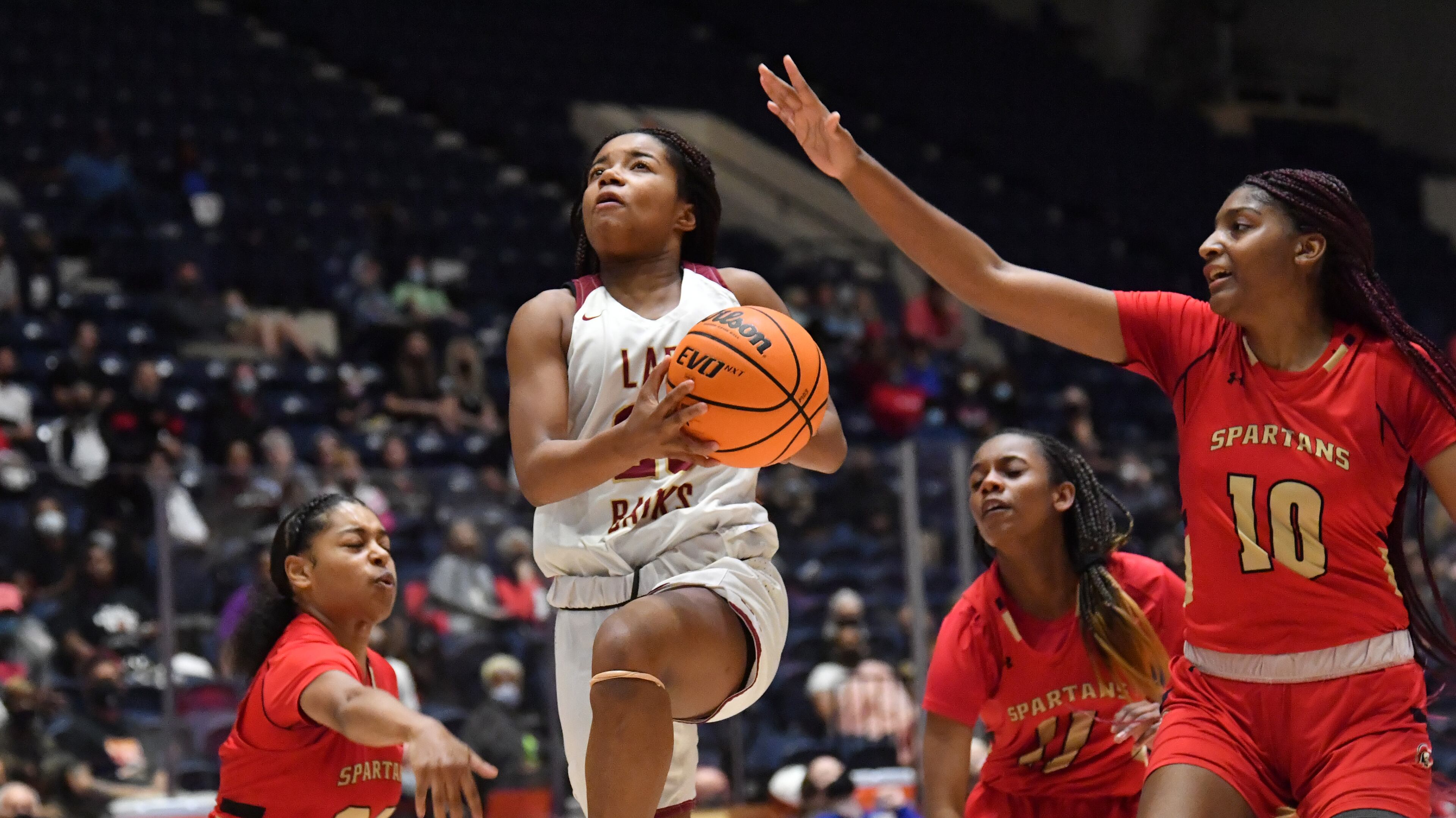 March 12, 2021 Macon - Cross Creek's Micheala Bogans (20) goes to the basket for a shot during the 2021 GHSA State Basketball Class AAA Girls Championship game at the Macon Centreplex in Macon on Friday, March 12, 2021 Cross Creek won 56-44 over Greater Atlanta Christian. (Hyosub Shin / Hyosub.Shin@ajc.com)