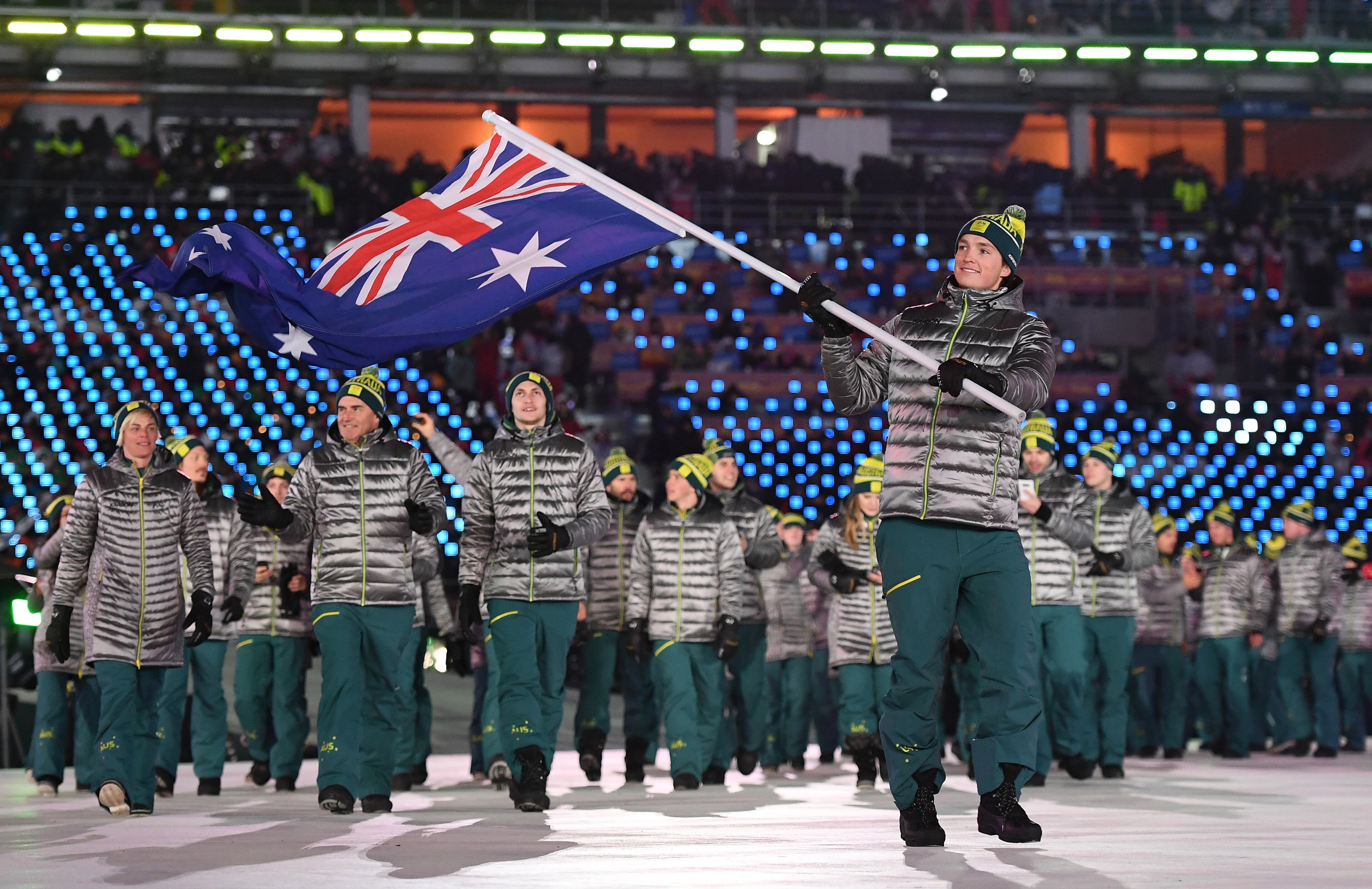 PYEONGCHANG-GUN, SOUTH KOREA - FEBRUARY 09: Flag bearer Scotty James of Australia leads his country out during the Opening Ceremony of the PyeongChang 2018 Winter Olympic Games at PyeongChang Olympic Stadium on February 9, 2018 in Pyeongchang-gun, South Korea. (Photo by Quinn Rooney/Getty Images)