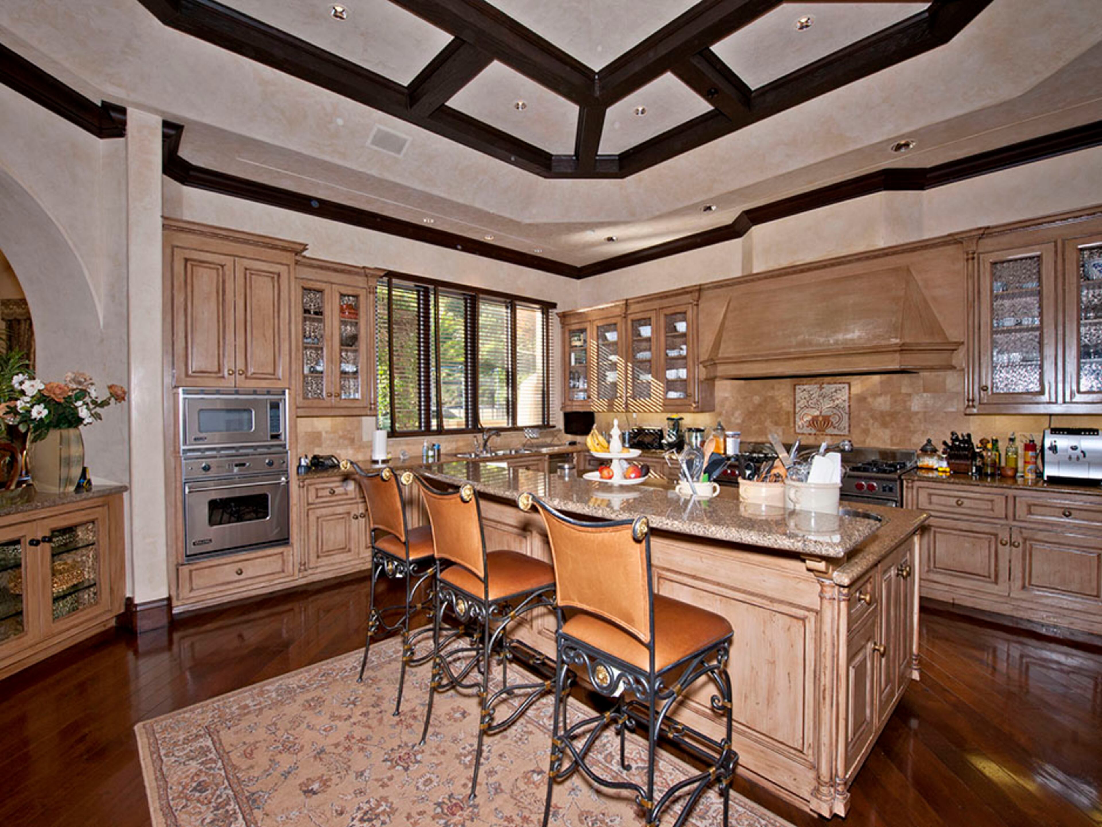 Former San Francisco Giants left fielder Barry Bonds is selling his 17,100-square-foot Beverly Park, Los Angeles, estate for $25 million. According to the listing by The Agency, the home has seven bedrooms, 13 baths, a 12-seat theater, a jacuzzi, a pool, an outdoor kitchen and a 2,100-square-foot sports court. For more details, visit http://www.toptenrealestatedeals.com/homes/weekly-ten-best-home-deals/2013/4-2-2013/.