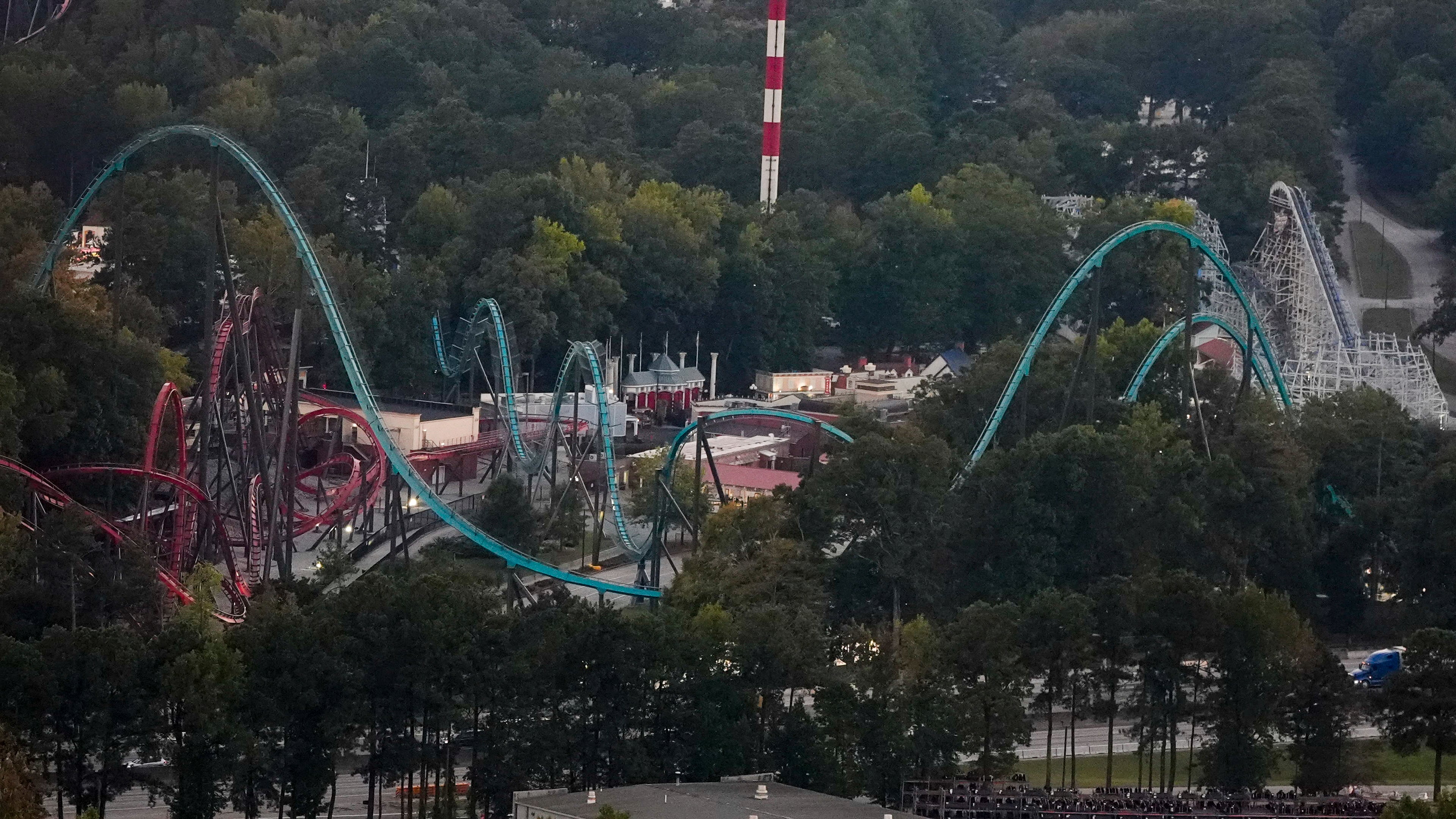 Attractions are seen at Six Flags Over Georgia, about 15 miles (24 kilometers) northwest of Atlanta, Thursday, Oct. 15, 2026, in Mableton. (AP Photo/Mike Stewart)