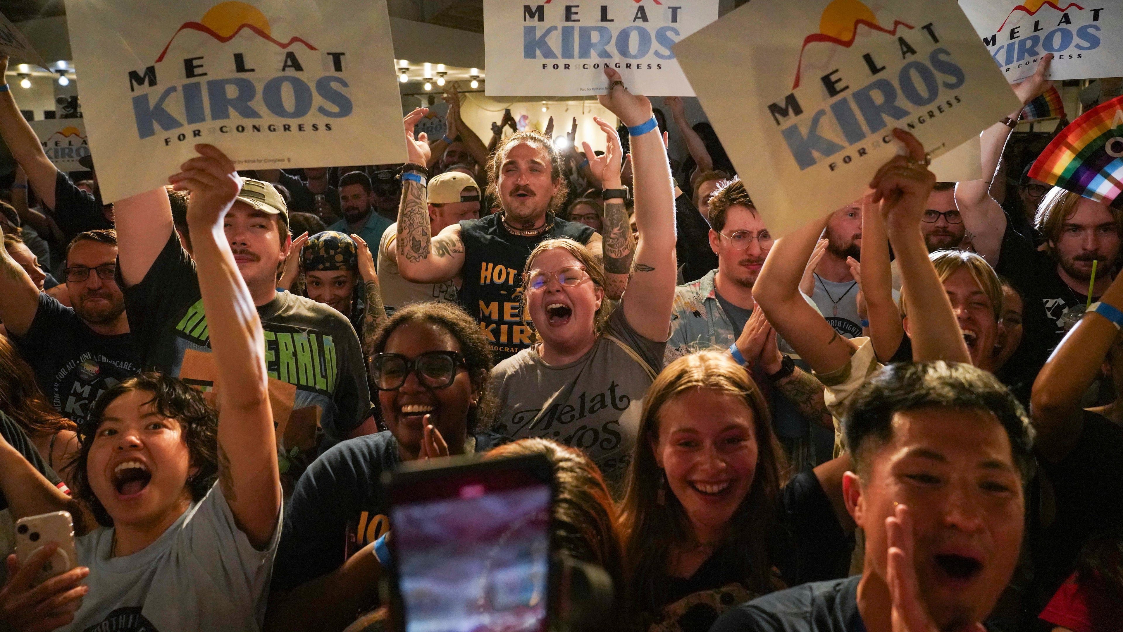 Attendees celebrate after Democratic congressional candidate Melat Kiros won the Democratic nomination during a primary election night watch party at The Broadway, Tuesday, June 30, 2026, in Denver. (AP Photo/Rebecca Slezak)