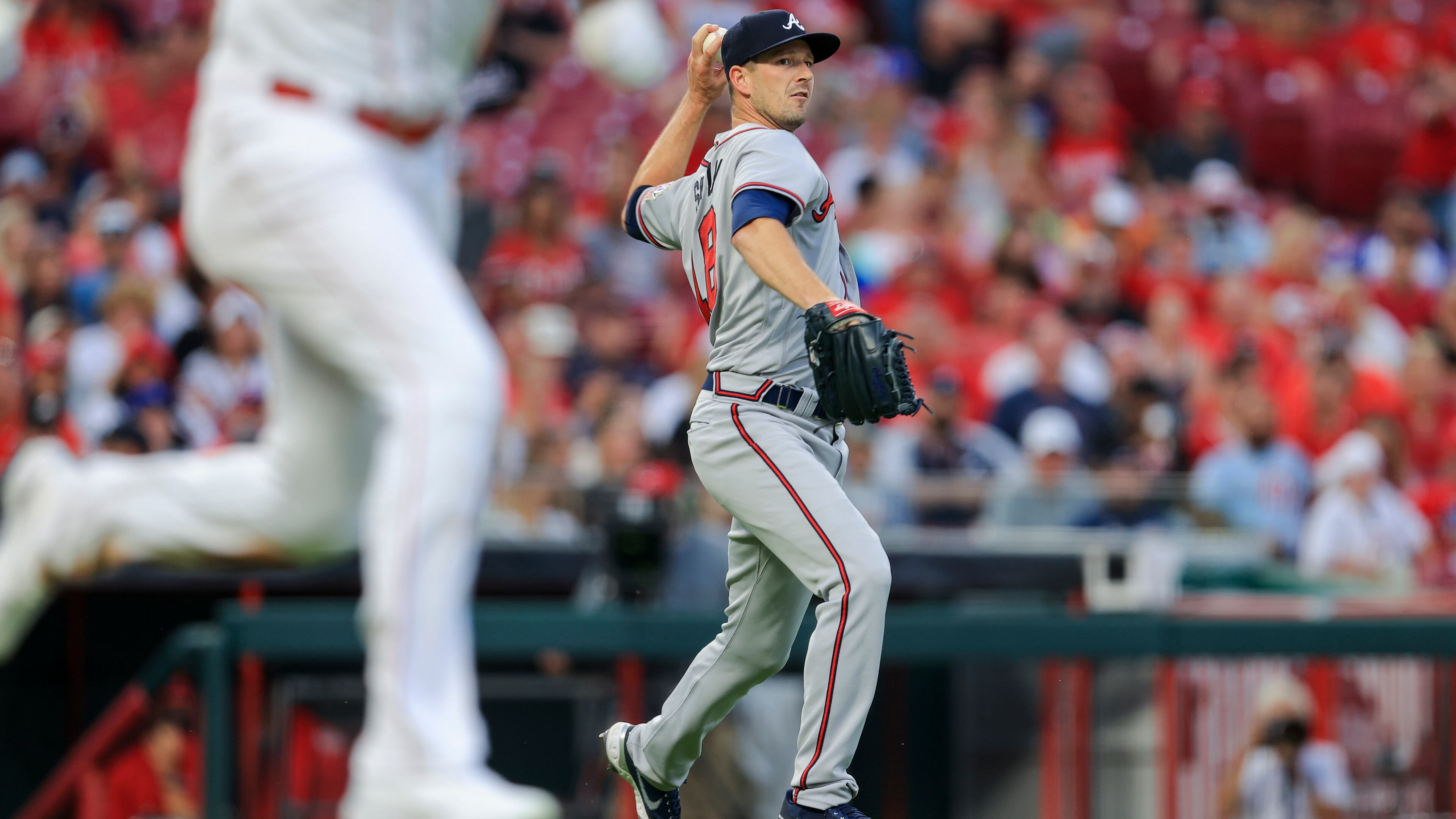 Drew Smyly fields the ball and throws out Reds baserunner Aristides Aquino at first during the fifth inning. Smyly pitched six innings and allowed one run with three strikeouts and no walks.