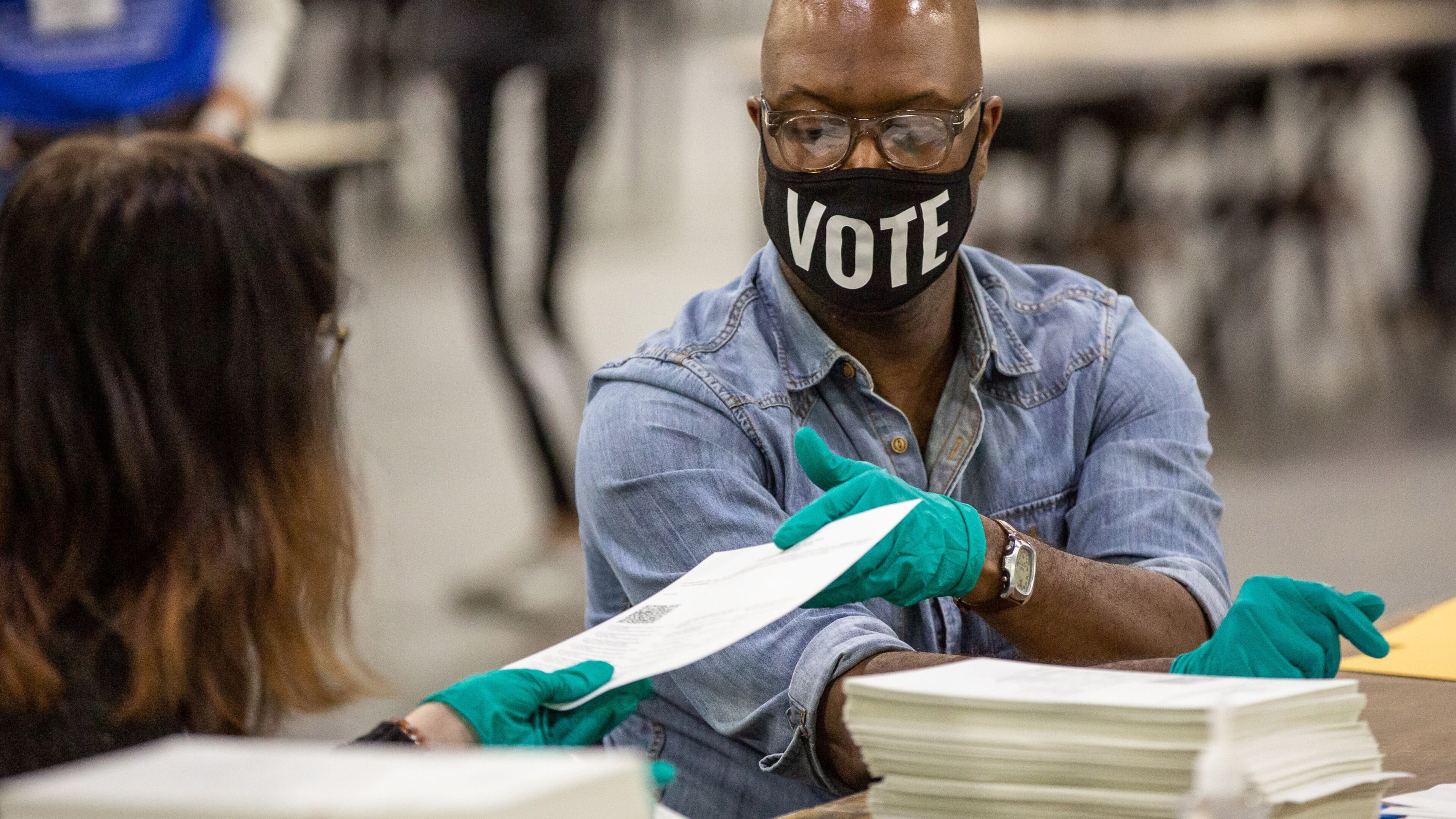 Fulton County election workers count the last of the presidential ballots at the Georgia World Congress Center Sunday, November 15, 2020. STEVE SCHAEFER / SPECIAL TO THE AJC