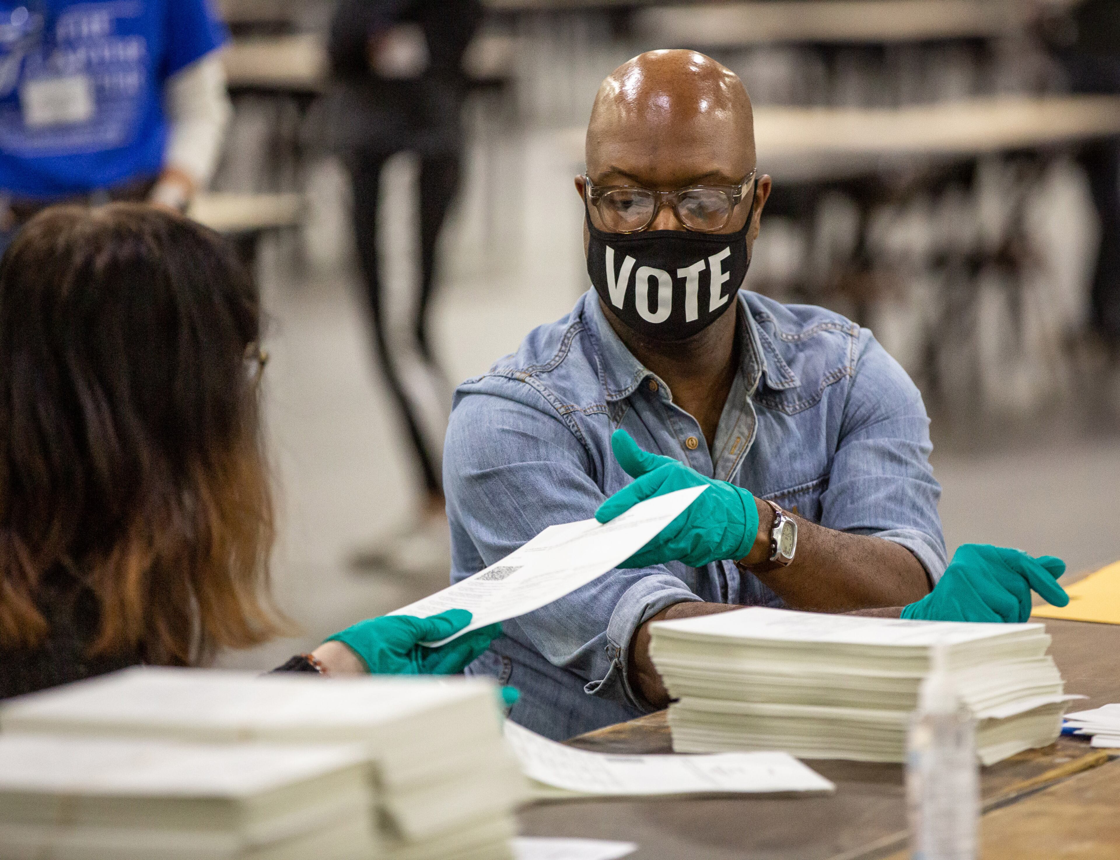 Fulton County election workers count the last of the presidential ballots at the Georgia World Congress Center on Sunday, November 15, 2020. STEVE SCHAEFER / SPECIAL TO THE AJC