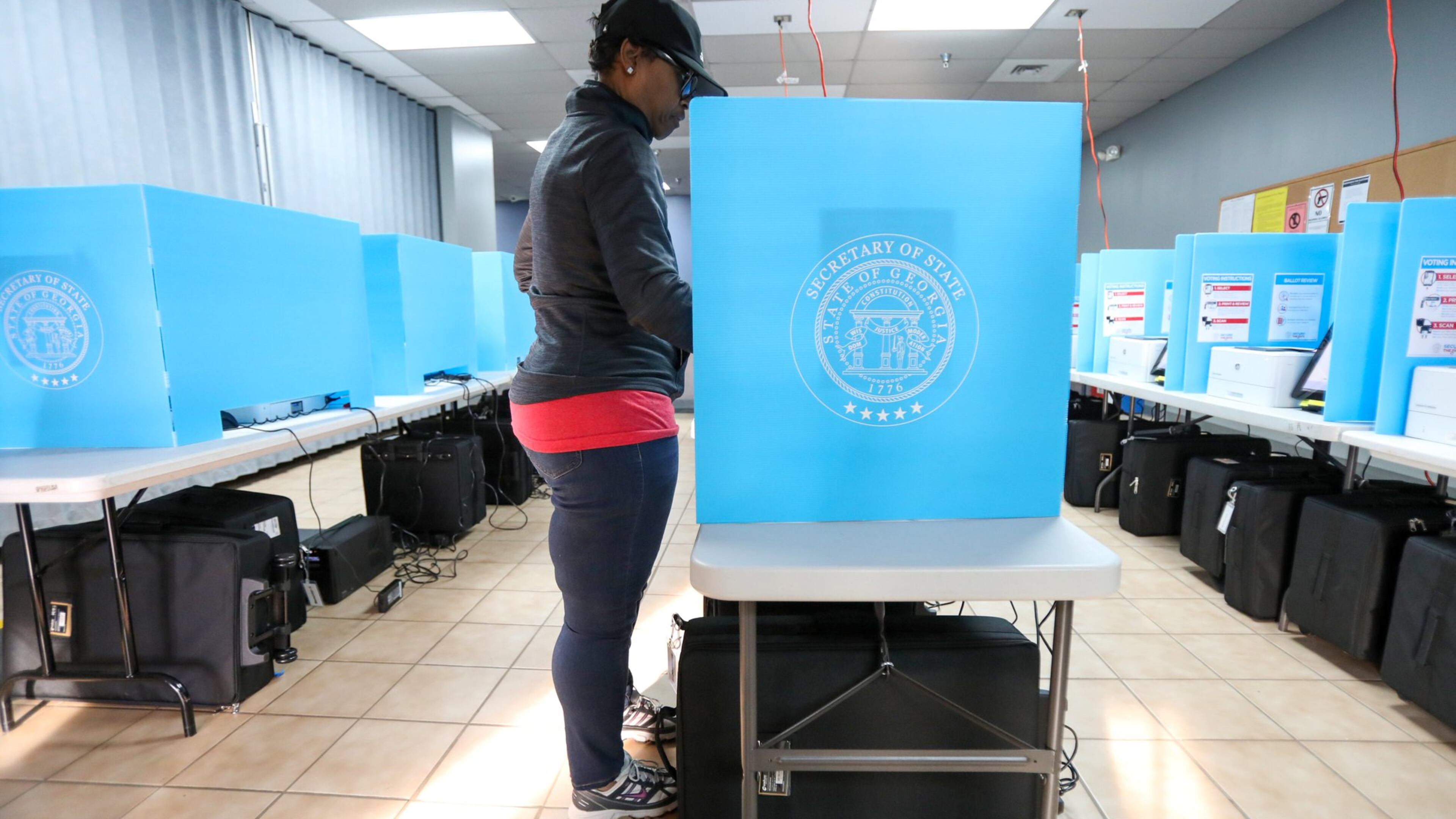 Yolanda Norman of DeKalb County uses te new voting machines at Voter Registration and Elections Office in Atlanta on Monday, March 2, 2020.