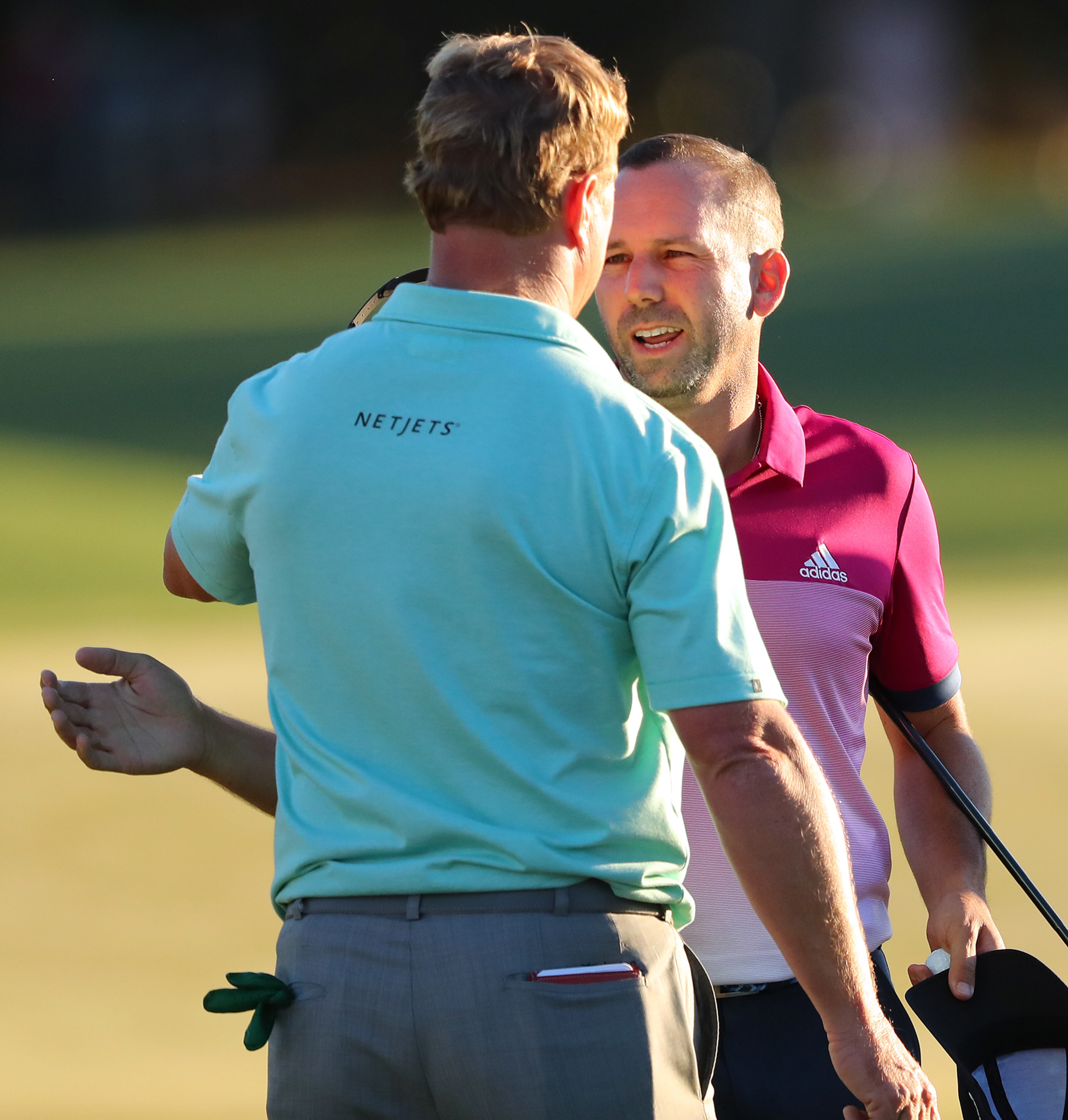 April 8, 2017, Augusta: Sergio Garcia and Charley Hoffman finish their round on the 18th green during the third round of the Masters at Augusta National Golf Club on Saturday, April 8, 2017, in Augusta. Curtis Compton/ccompton@ajc.com