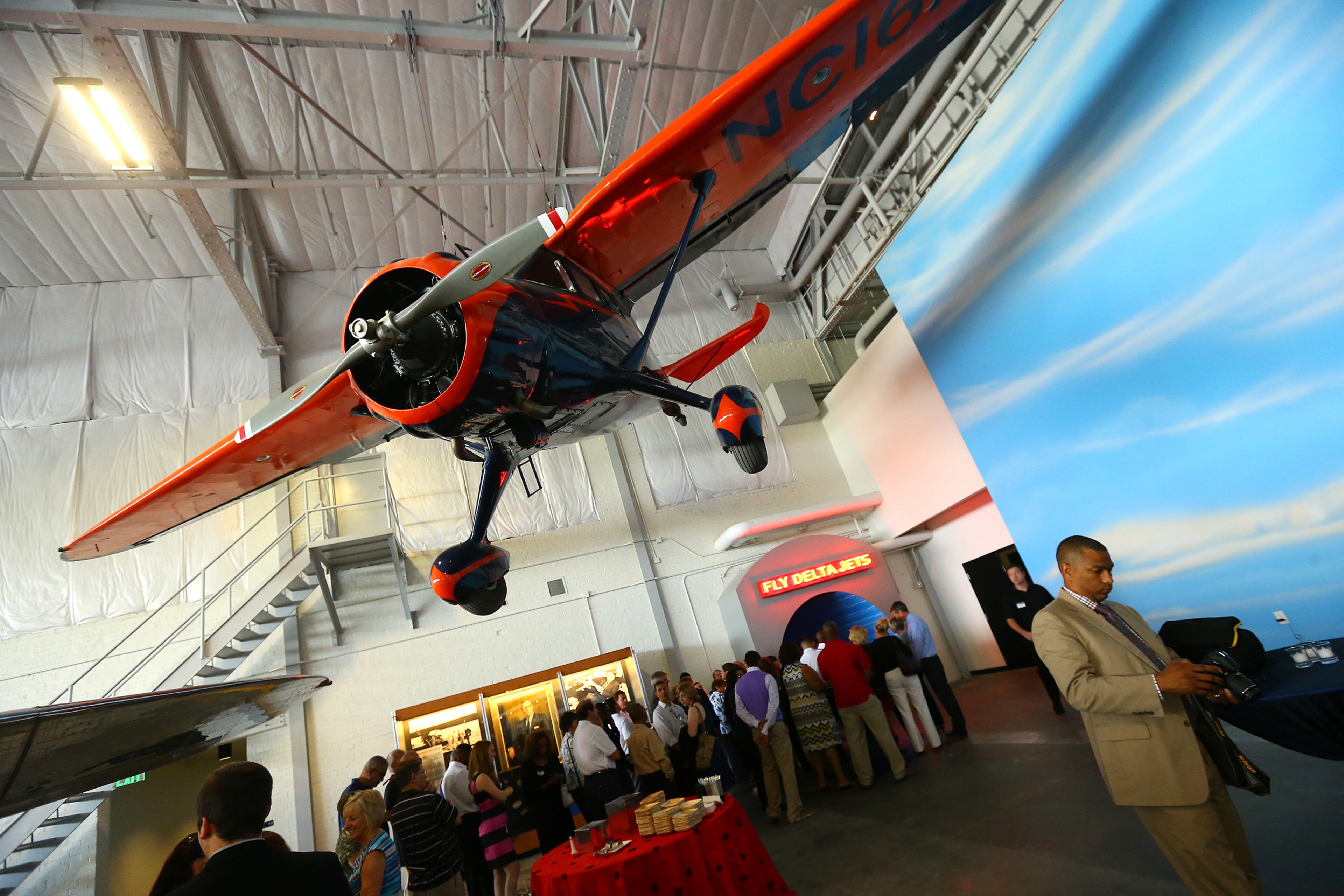 061214 ATLANTA: A later model Northeast Arilines Stinson SR-8E Reliant built in 1936 hangs from the ceiling of a hanger at the Delta Flight Museum on Thursday, June 12, 2014, in Atlanta. Nicknamed the 'gullwing" for their unique double-taper wing design, the plane was used as an instrument trainer. CURTIS COMPTON / CCOMPTON@AJC.COM