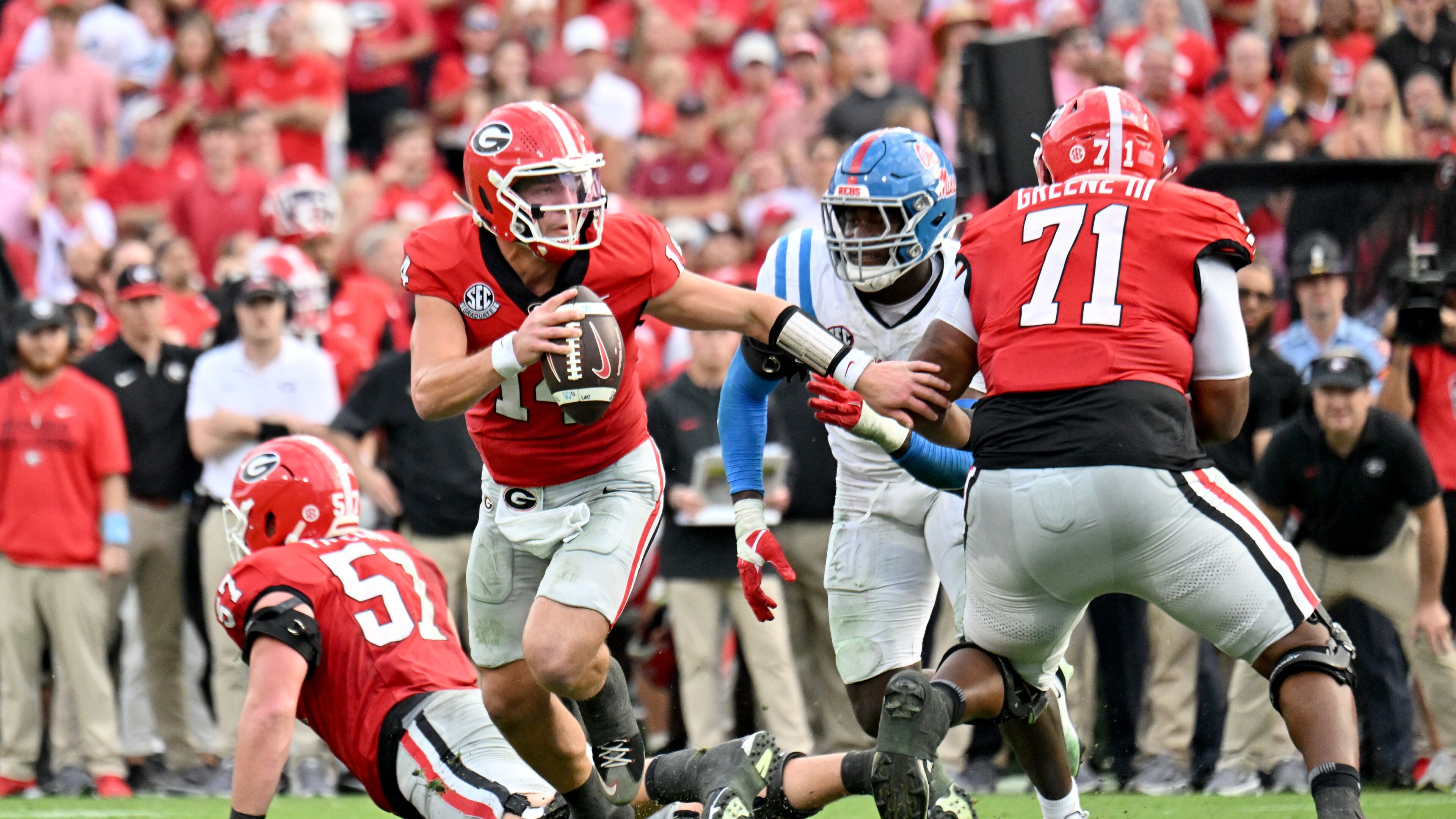 Georgia quarterback Gunner Stockton had to help carry his team to a win over Ole Miss and that's what he did on Saturday, continuing to score points when the defense struggled to get stops. (Hyosub Shin/AJC)