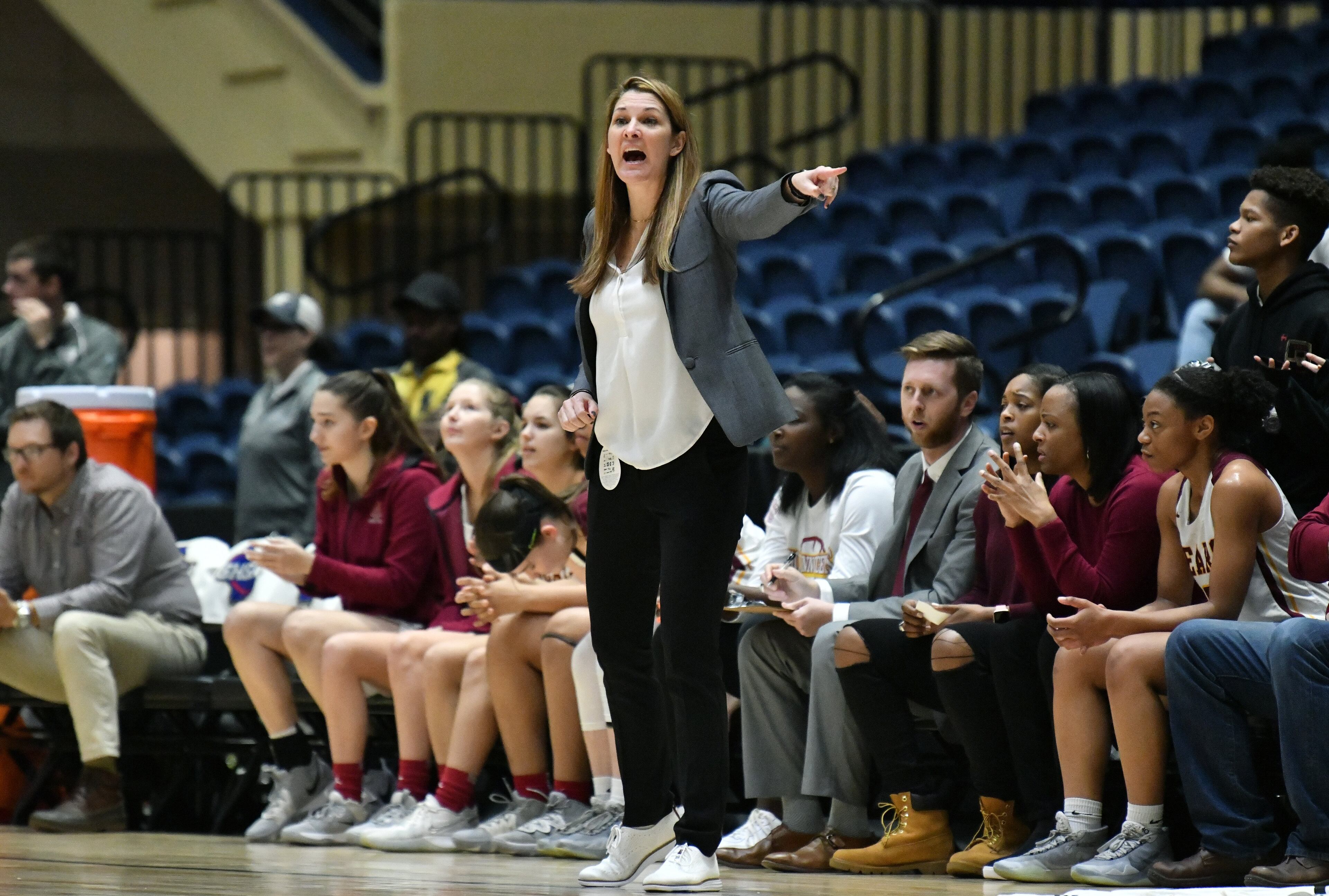 Holy Innocents head coach Nichole Dixon shouts instructions. (Hyosub Shin / Hyosub.Shin@ajc.com)