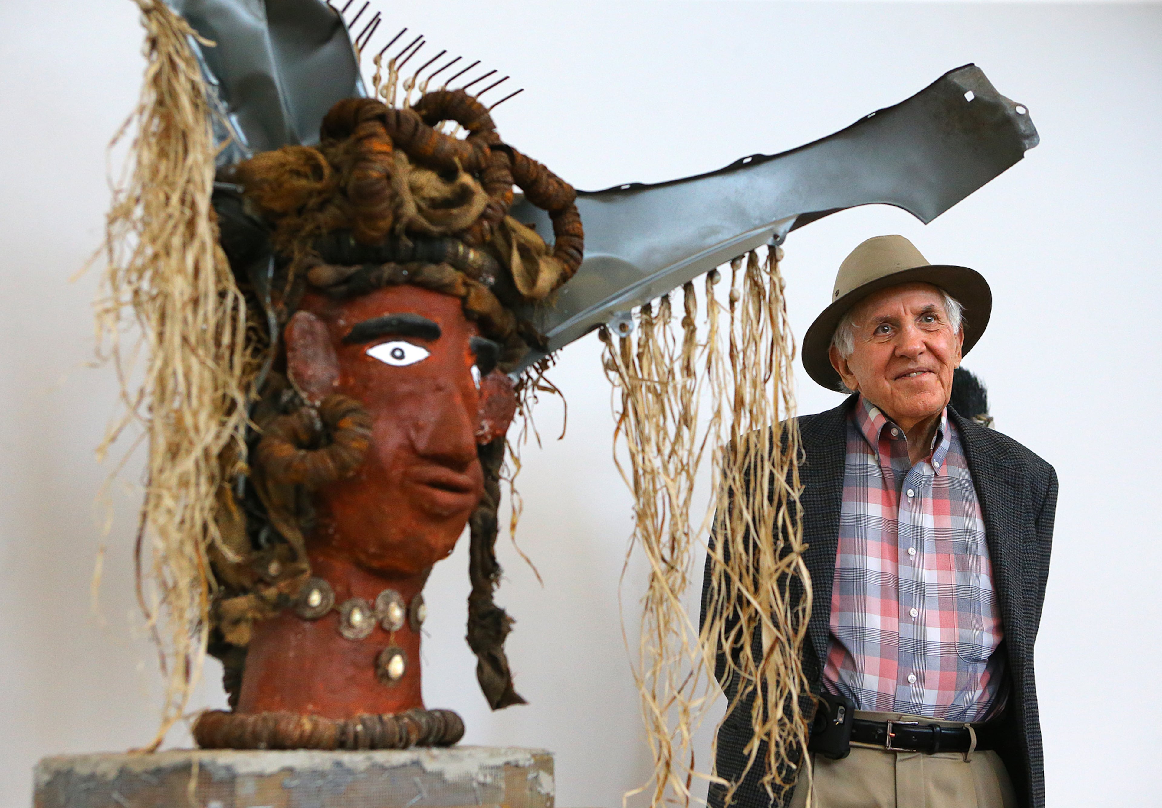 Richard Keil, founder of the Tubman Museum of African American Art, History and Culture in Macon, stands next to an untitled two-headed sculpture by Mr. Imagination, during a tour of the facility on Wednesday, May 6, 2015. Curtis Compton / ccompton@ajc.com