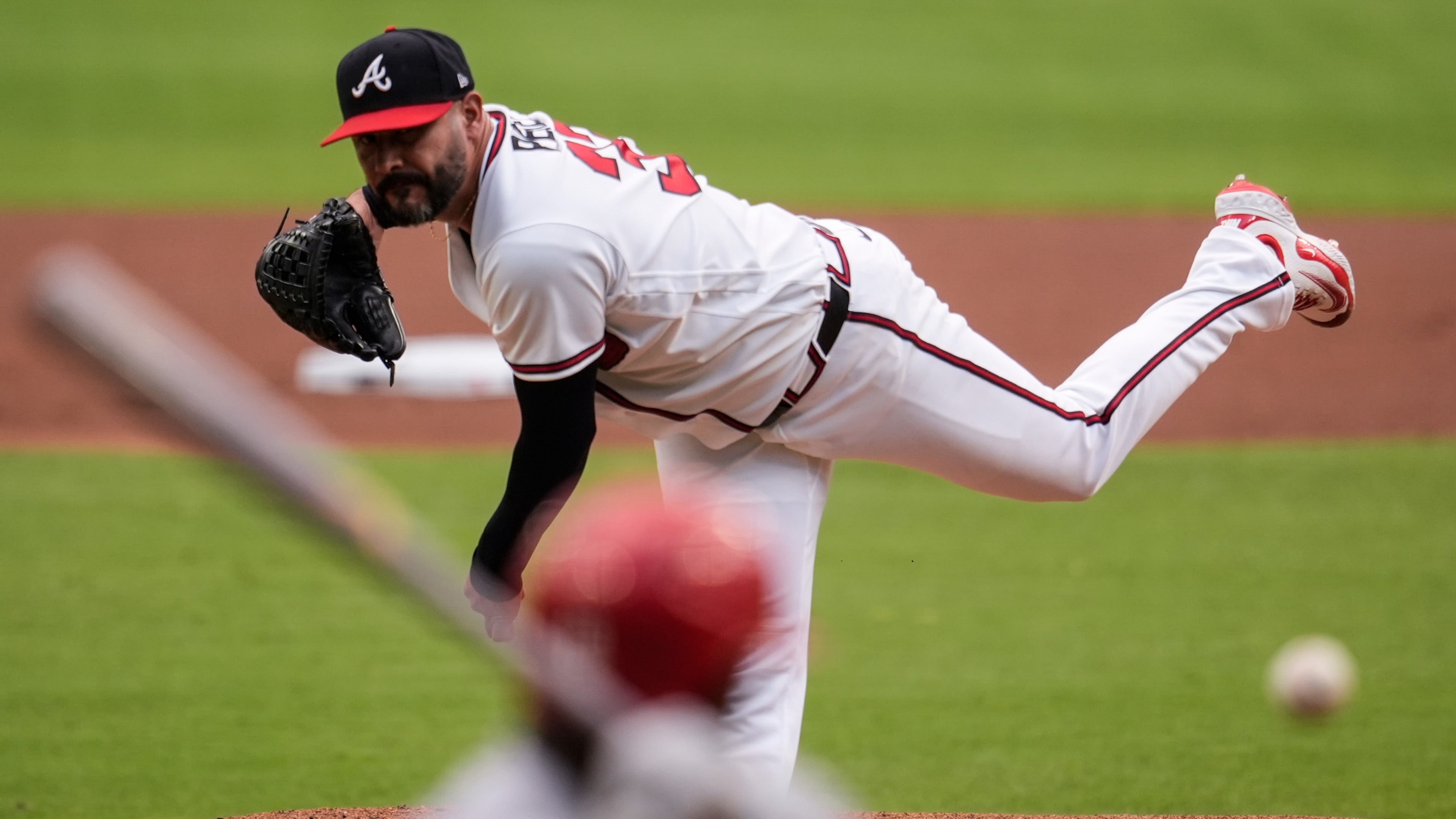Atlanta Braves pitcher Martín Pérez (33) works against St. Louis Cardinals' Jordan Walker in the first inning of a baseball game, Tuesday, June 30, 2026, in Atlanta. (AP Photo/Mike Stewart)
