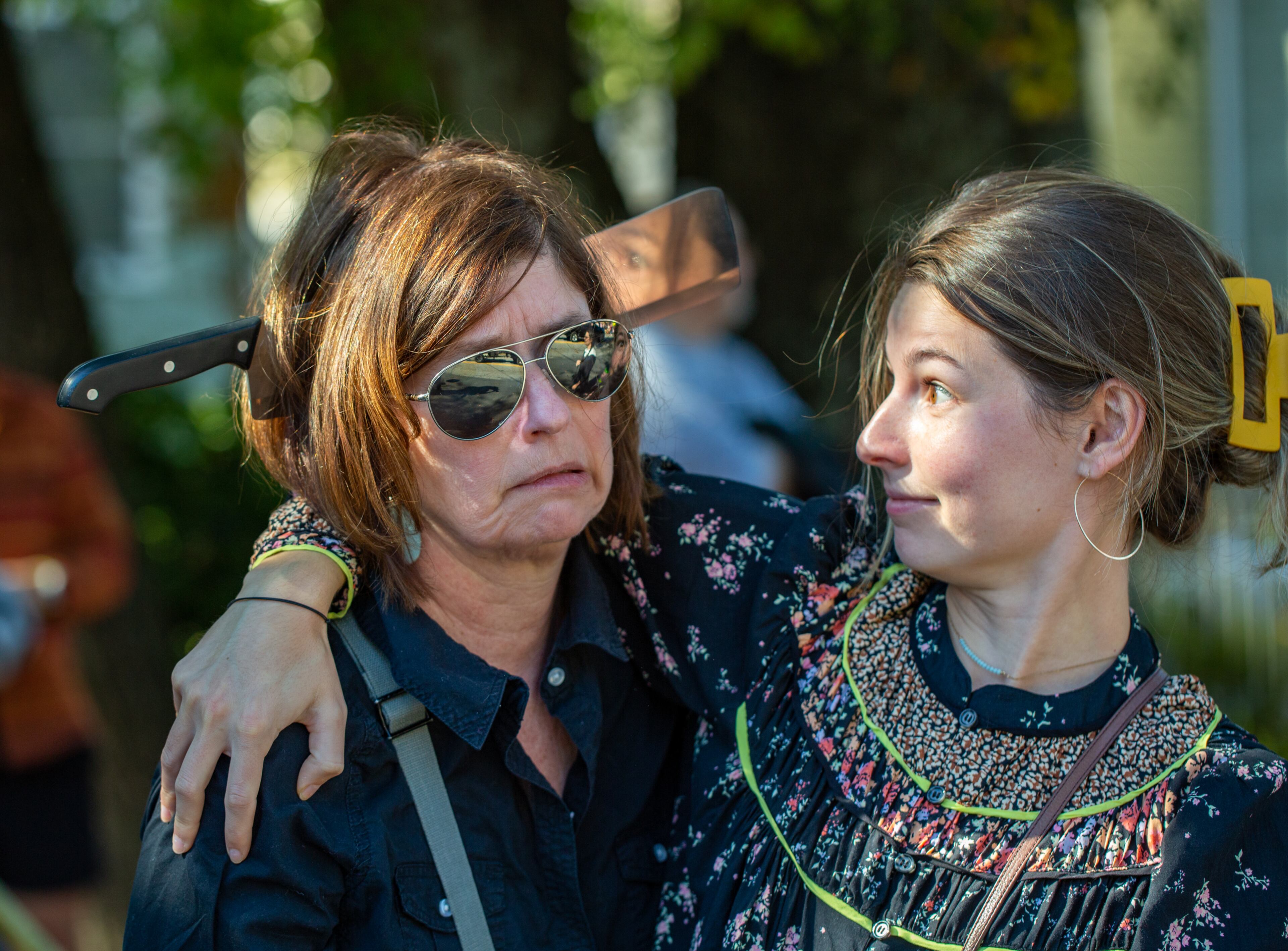Stephanie Simmons (left) and her daughter Lizzie Gafford get into the spirit at the annual Little Five Points Halloween Parade on Sunday, Oct 23, 2022. (Jenni Girtman for The Atlanta Journal-Constitution)