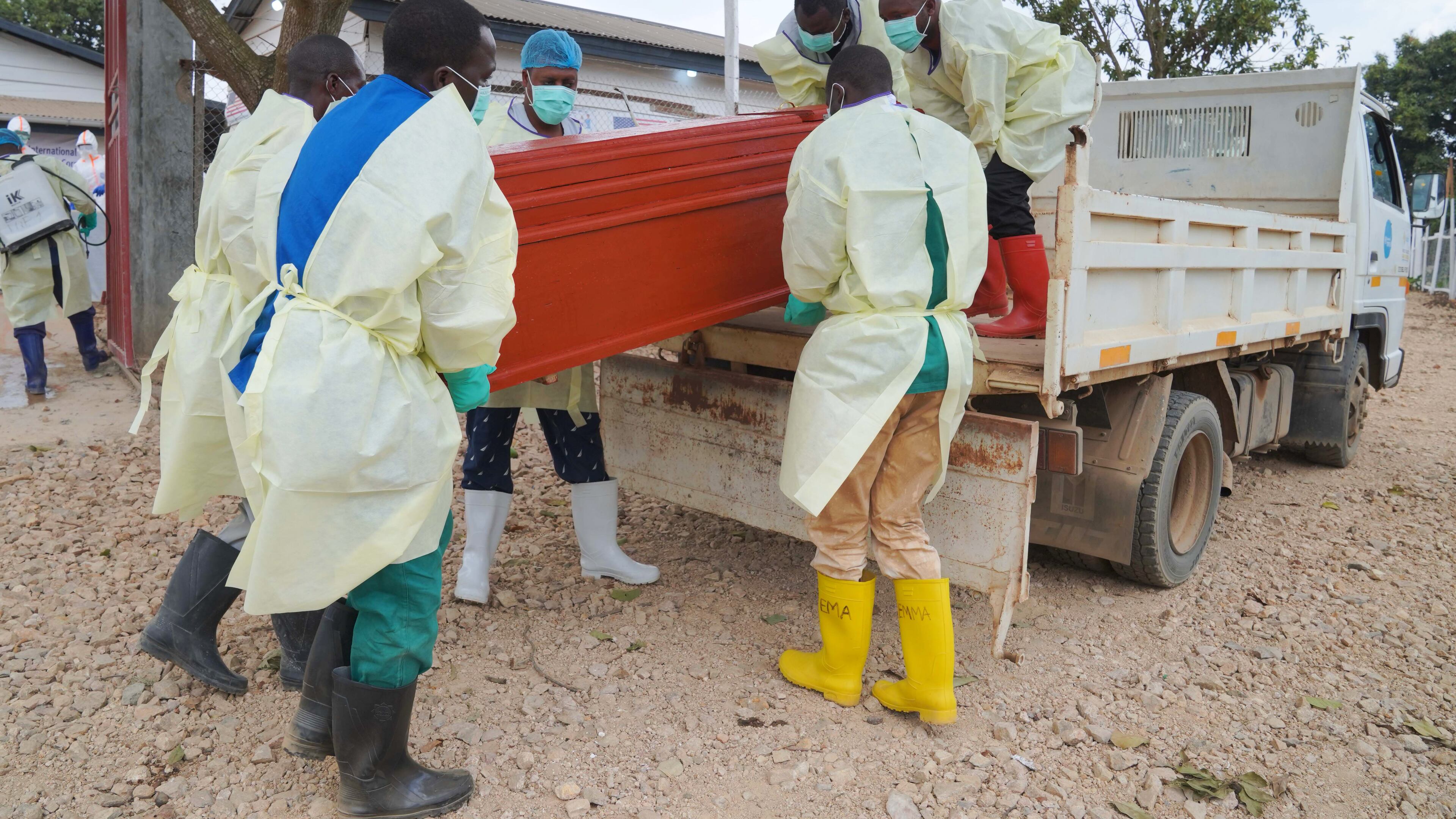 Health workers who are members of the safe and dignified burial team prepare to bury Abineno Justine, a 38 year old woman who died of the Ebola virus, in Bunia, Congo, Friday, Sept. 4, 2026. (AP Photo/Dieudonne Dirole)
