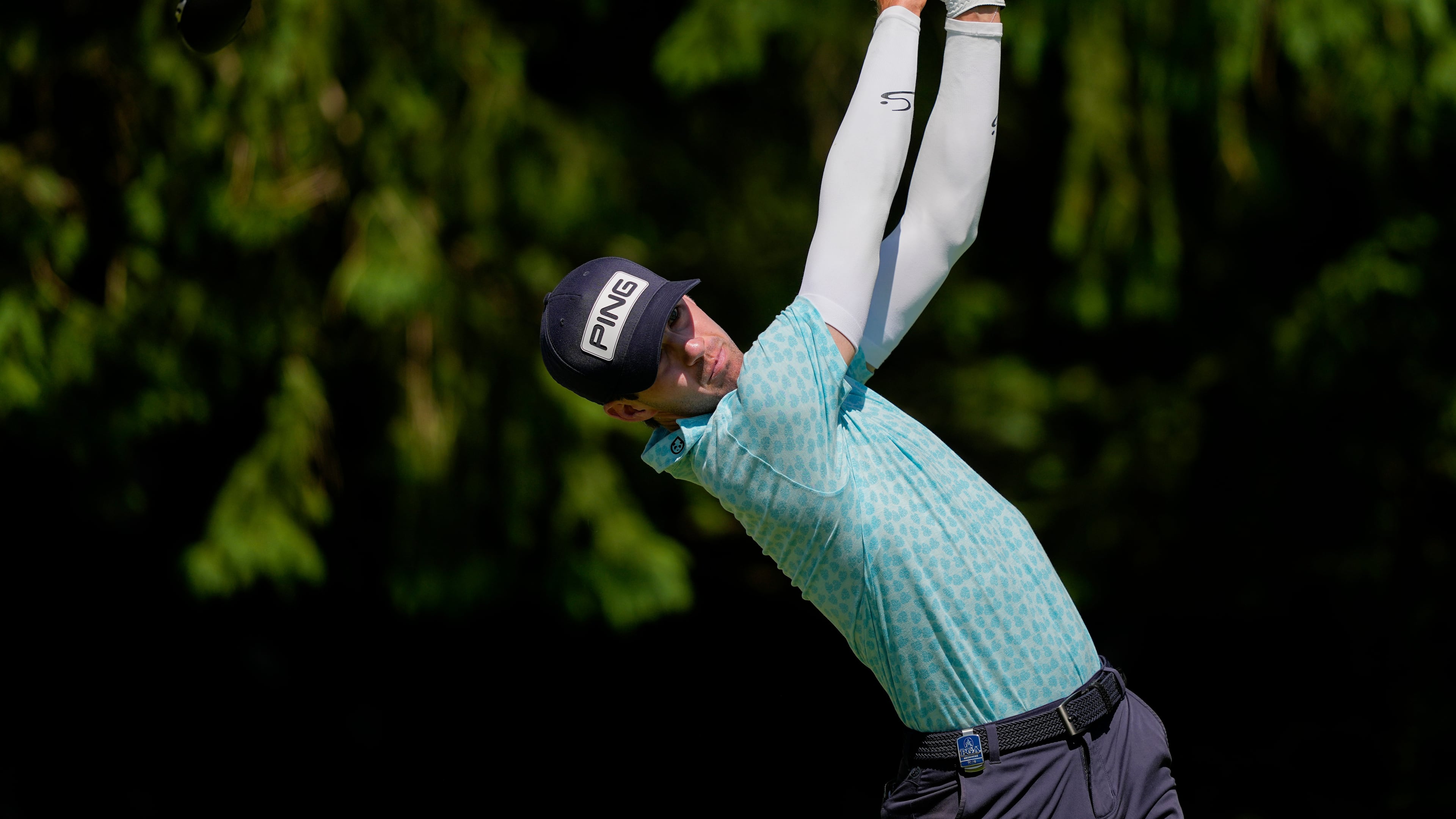 Alex Smalley hits from the fourth tee during the third round of the PGA Championship golf tournament at Aronimink Golf Club, Saturday, May 16, 2026, in Newtown Square, PA. (AP Photo/Carolyn Kaster)