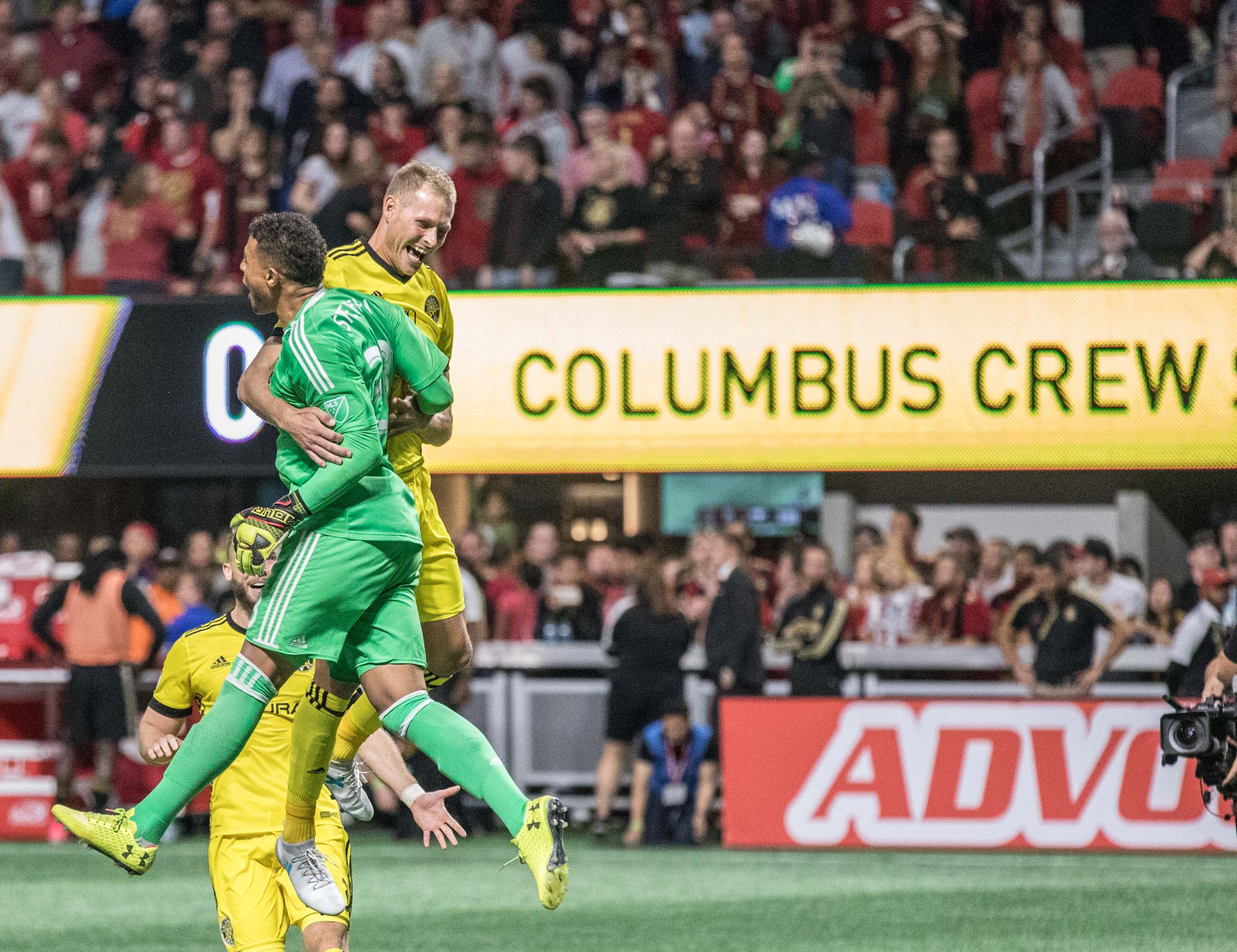 Columbus Crew players celebrate after defeating Atlanta United during a MLS playoff game at Mercedes-Benz Stadium, Thursday, Oct. 26, 2017, in Atlanta. BRANDEN CAMP/SPECIAL