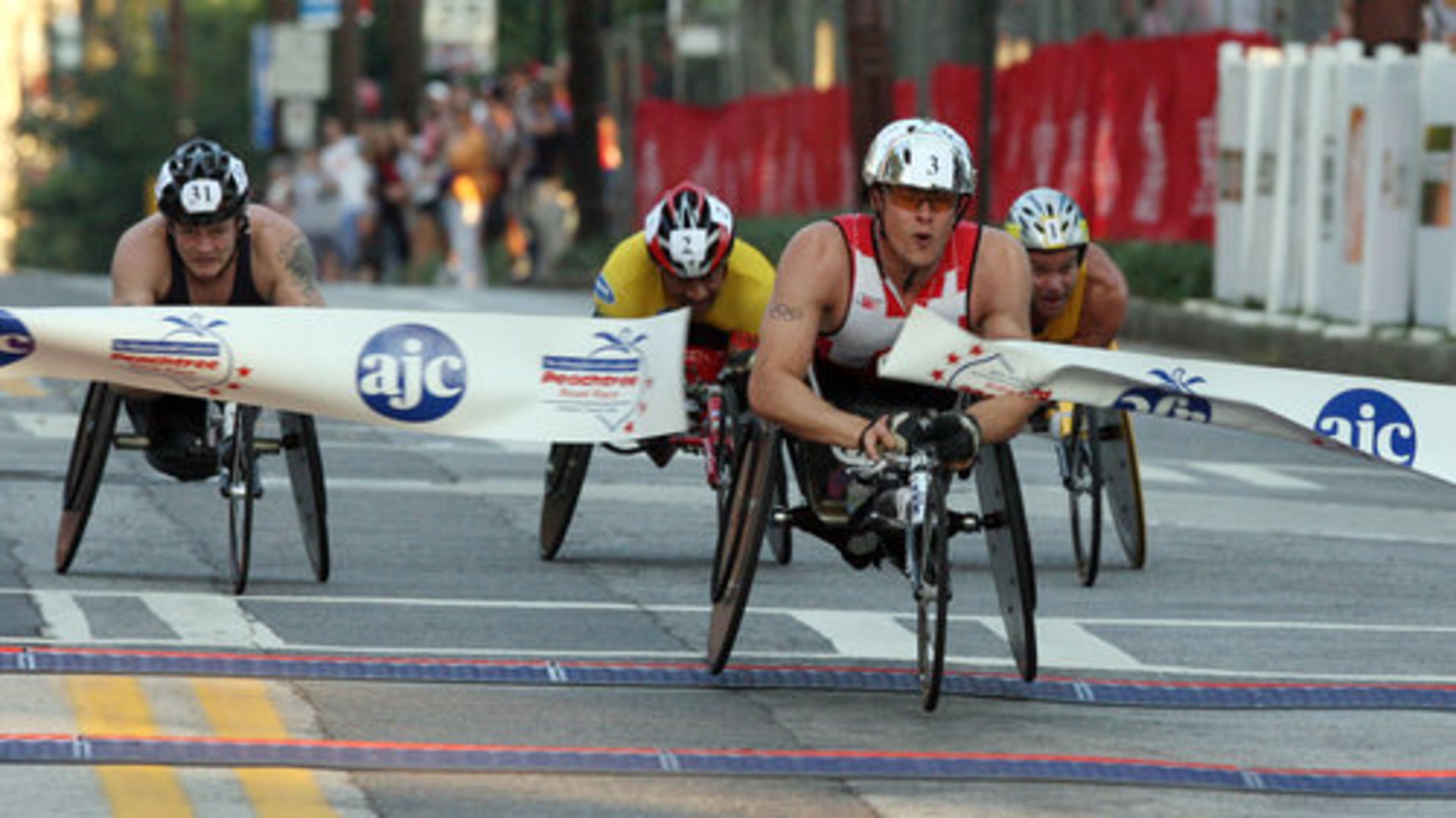 Hug, who was born with spinal bifada, won medals at the Paralympic Games in Athens in 2004.
