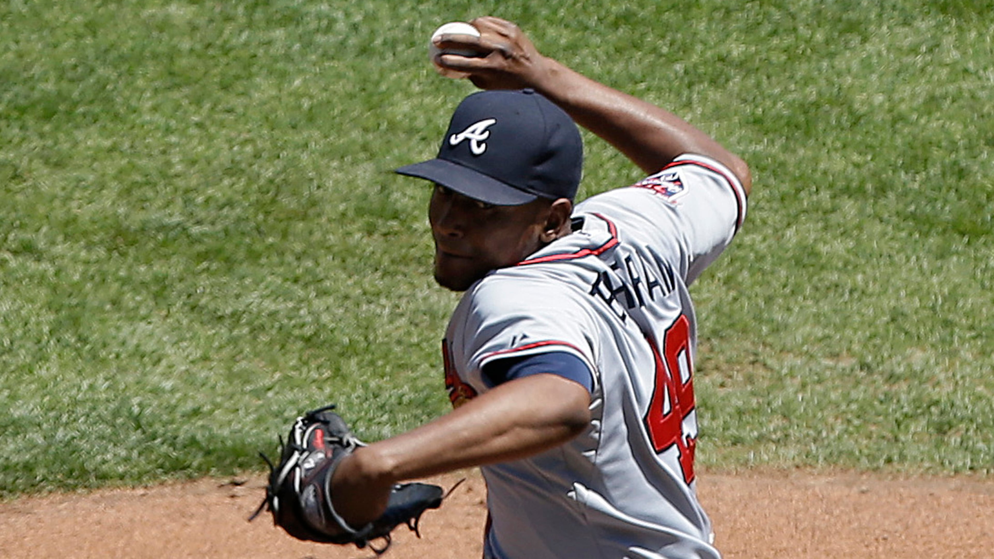 Atlanta Braves pitcher Julio Teheran (49) throws against the San Francisco Giants during the first inning of a baseball game in San Francisco, Wednesday, May 14, 2014. (AP Photo)