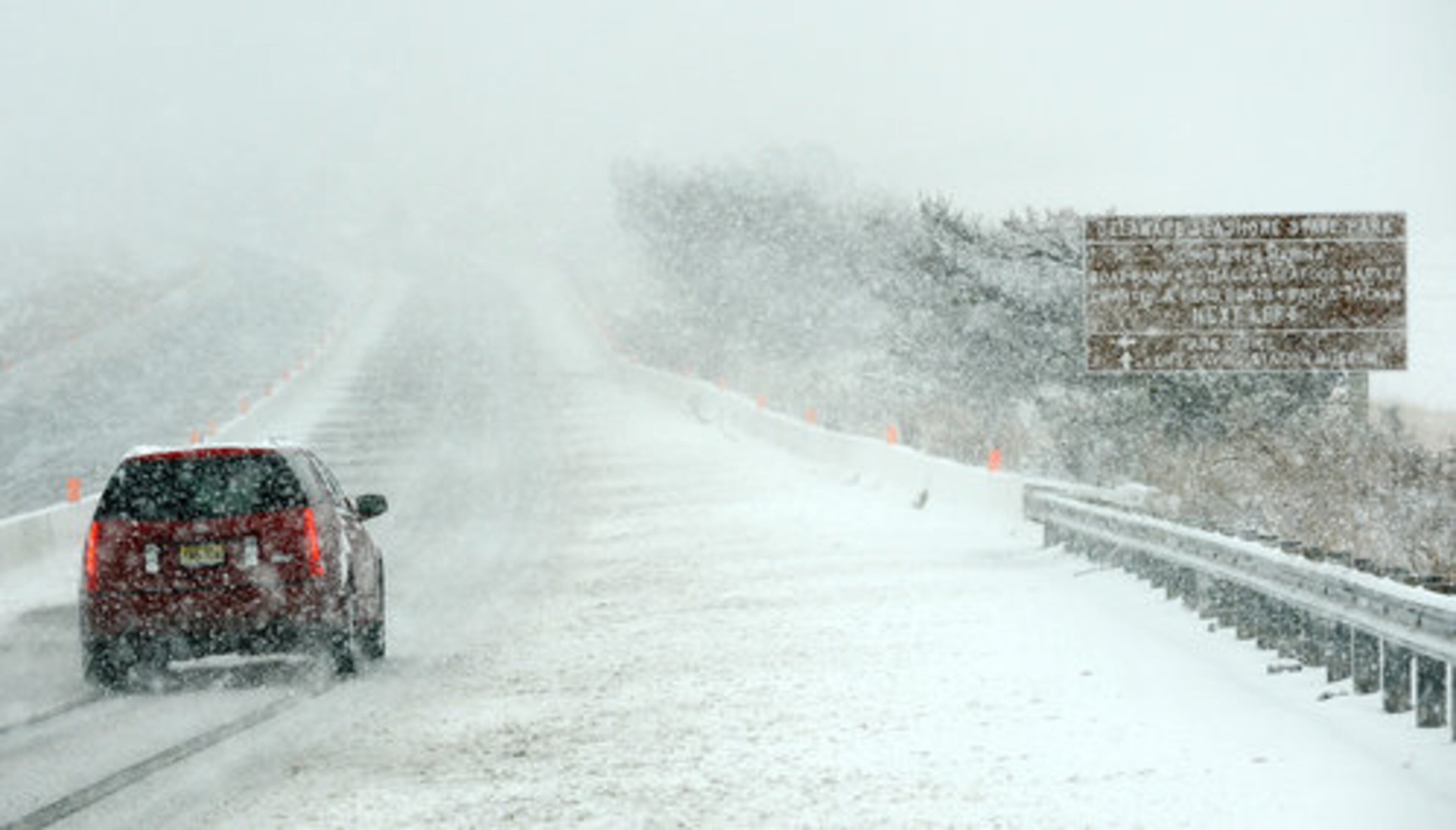 Snow falls at the Indian River Inlet in Delaware Seashore State Park, Sunday, Dec. 26, 2010.