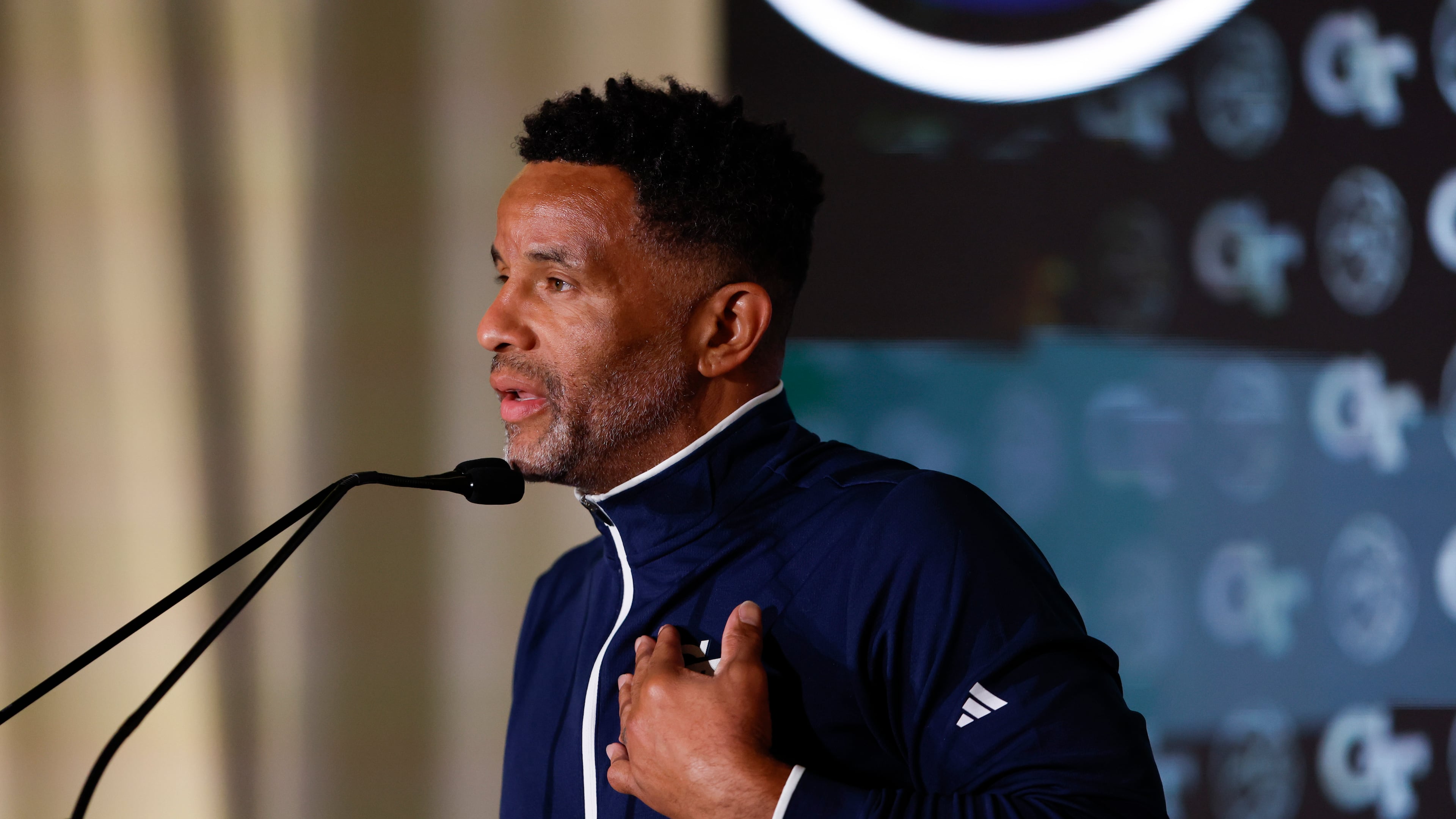 Georgia Tech coach Damon Stoudamire — pictured speaking during the ACC Tipoff in 2024 — says he feels the Yellow Jackets are on the right trajectory heading into his third season and "have the pieces" to make the NCAA Tournament in March. (Nell Redmond/ACC 2024)