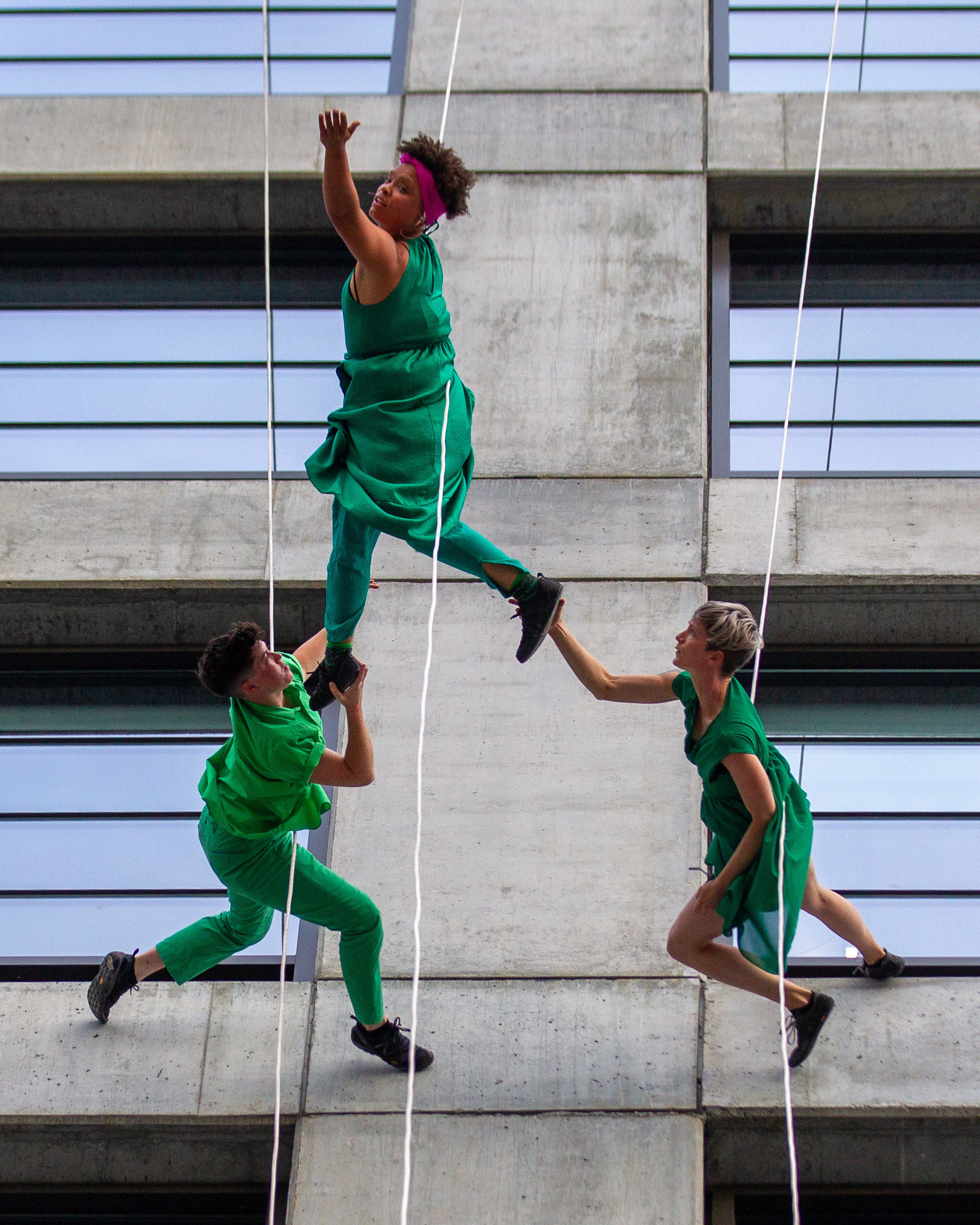 Bandaloop dancers perform on the side of a building facing the Atlanta Beltline on Sunday, October 3, 2021. The ensemble of dancers uses climbing ropes and harnesses to perform suspended in mid-air, usually on the side of a multistory building. (Photo: Steve Schaefer for The Atlanta Journal-Constitution)