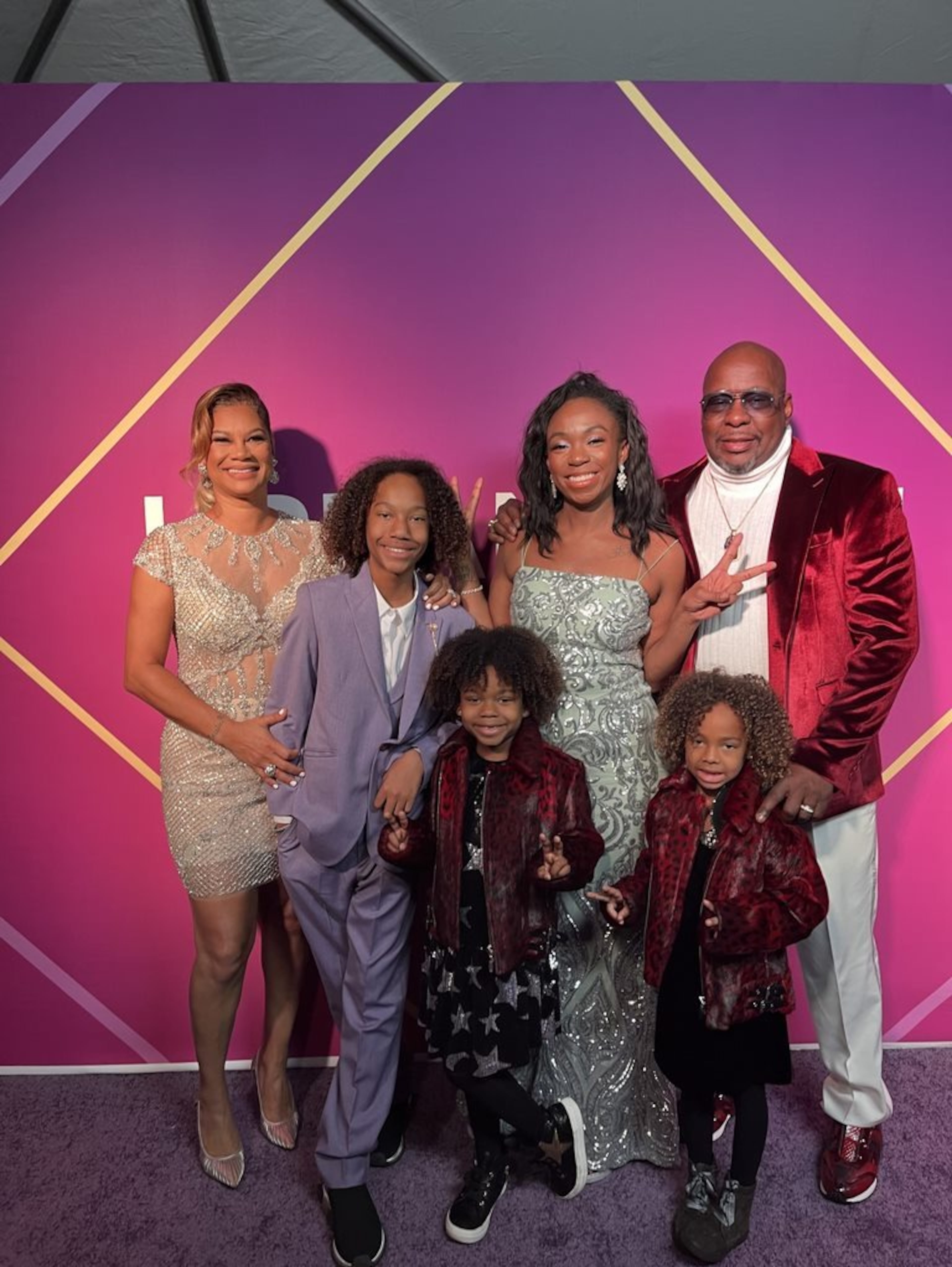 Bobby Brown and family at the Urban One Honors red carpet (2022)