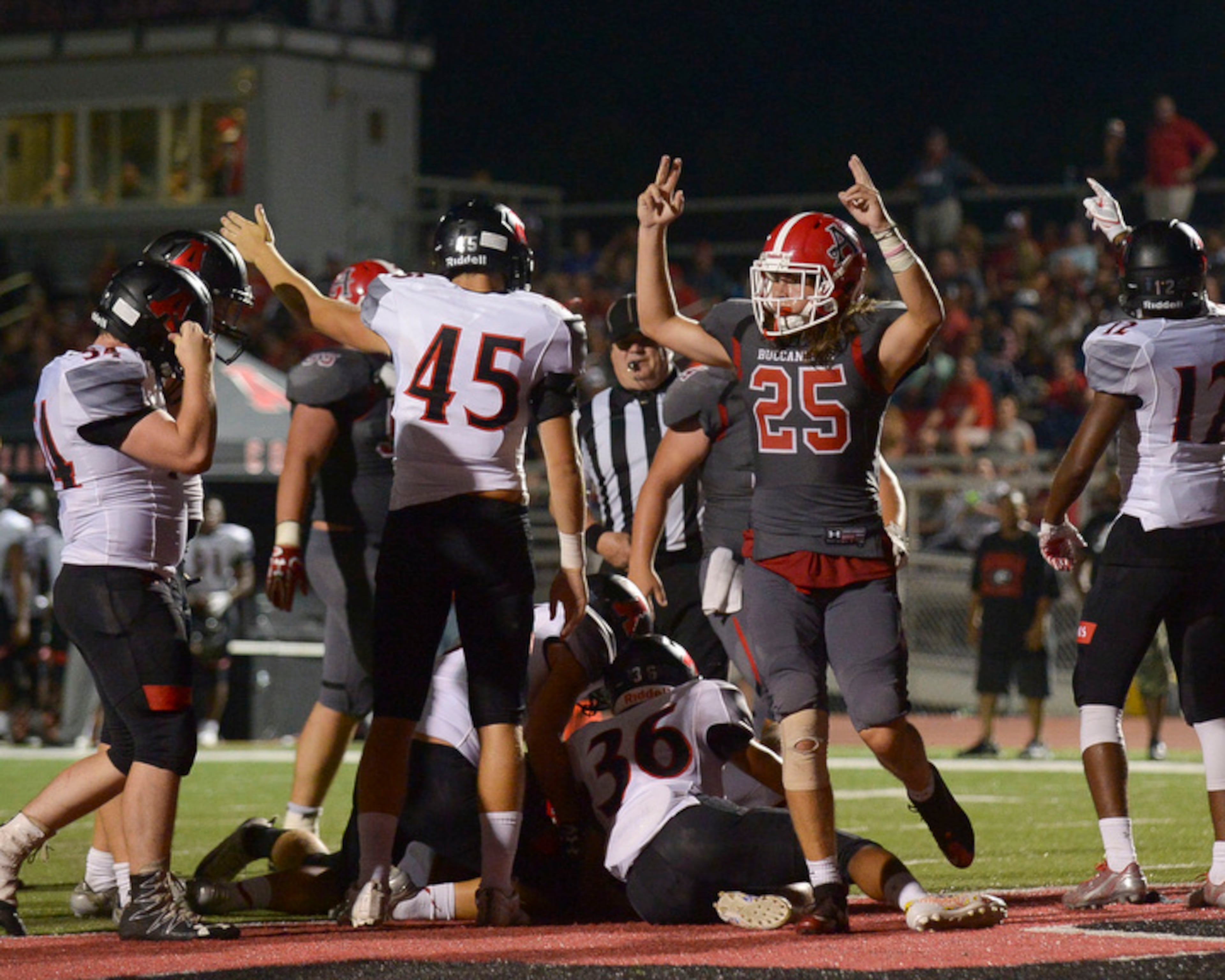 Allatoona junior OLB Mario Gambaccini (25) signals a touchdown in the second half of his game against Alexander Friday, August 25, 2017. Special/Daniel Varnado