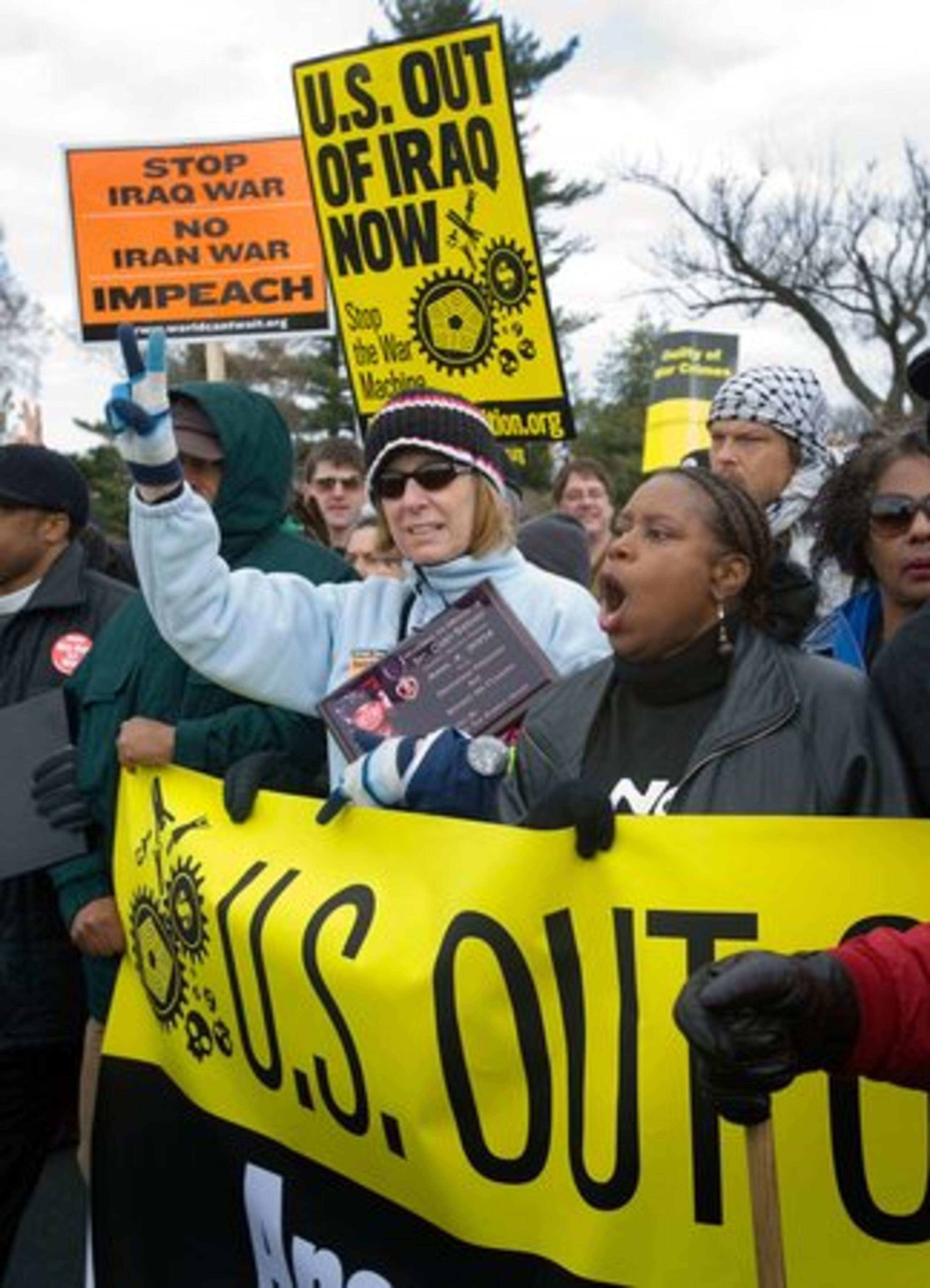 Cindy Sheehan, holding a photo of her son Casey, and McKinney lead thousands of peace activists in Washington, DC. on March 17, 2007, for the antiwar "march on the Pentagon" to mark the fourth anniversary of the Iraq war and also the 40th anniversary of the Vietnam-era march on the Pentagon.