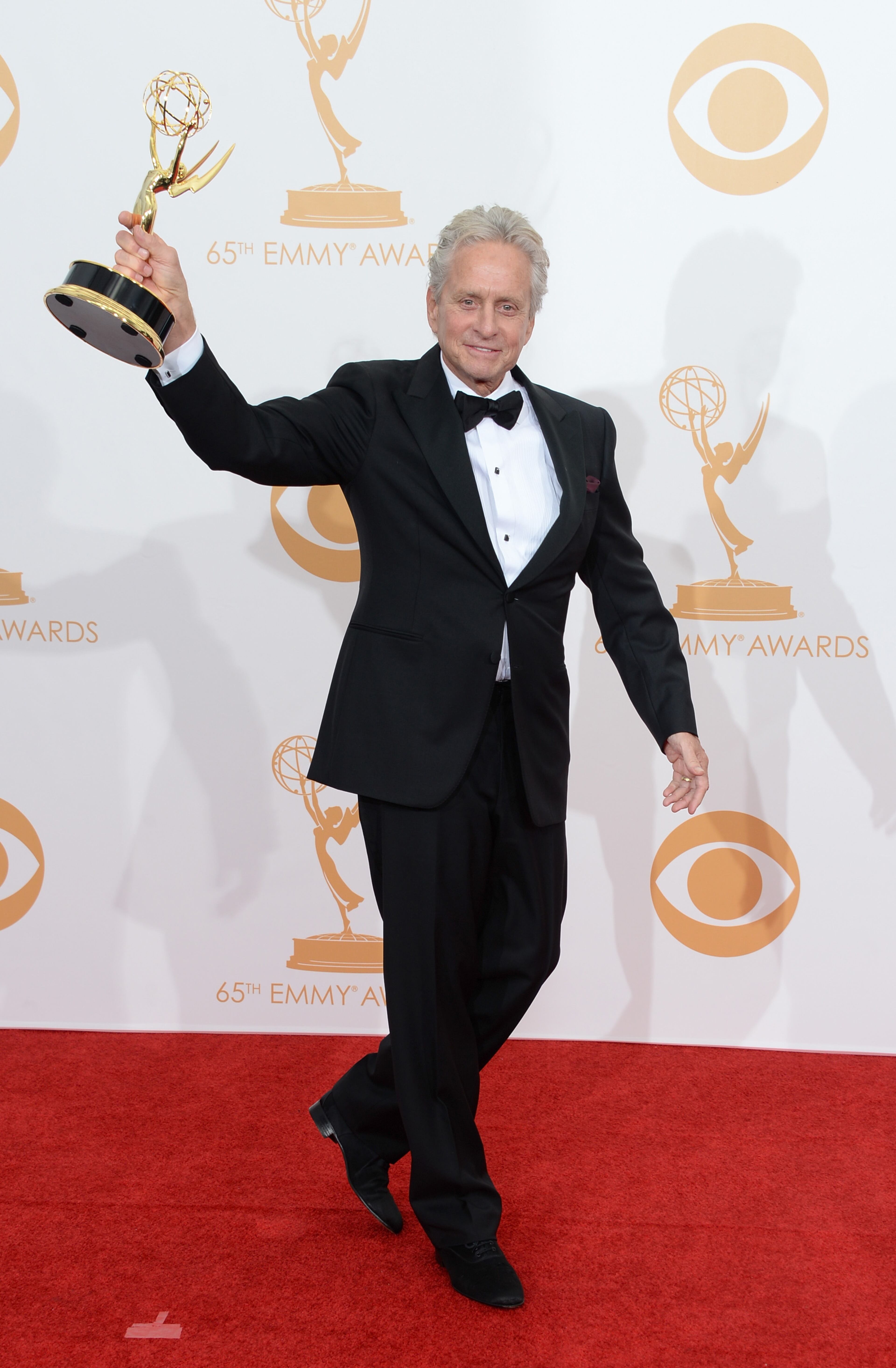 LOS ANGELES, CA - SEPTEMBER 22: Actor Michael Douglas, winner of the Best Lead Actor in a Miniseries or Movie Award for "Behind The Candelabra" poses in the press room during the 65th Annual Primetime Emmy Awards held at Nokia Theatre L.A. Live on September 22, 2013 in Los Angeles, California. (Photo by Jason Merritt/Getty Images)