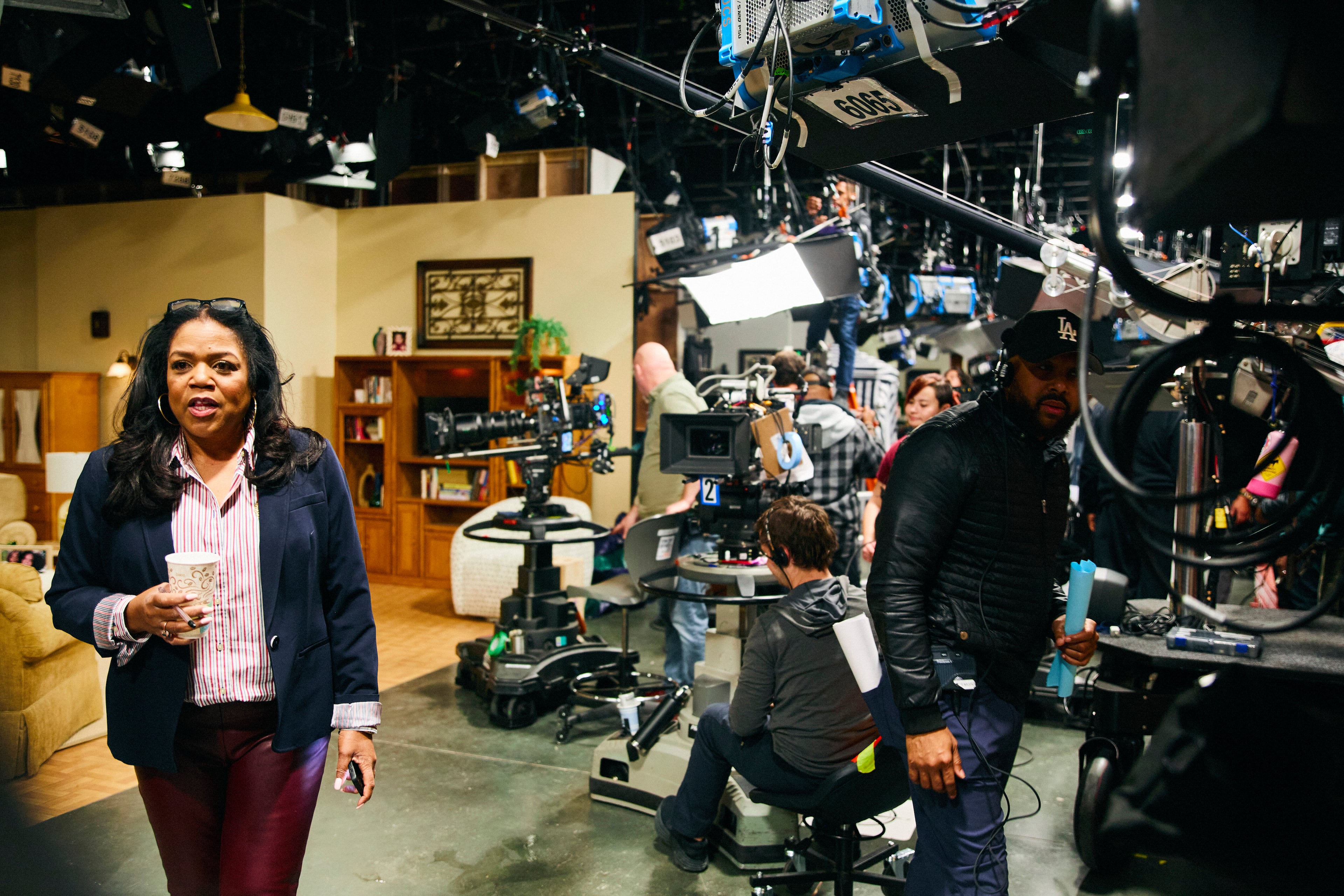 Sheila Ducksworth, executive producer of "Beyond the Gates," walks on the set at Assembly Atlanta, a studio complex in Doraville, on Thursday, Feb. 13, 2025. For Ducksworth, bringing this show to the air is the culmination of years of effort. (Eric Hart/The New York Times)