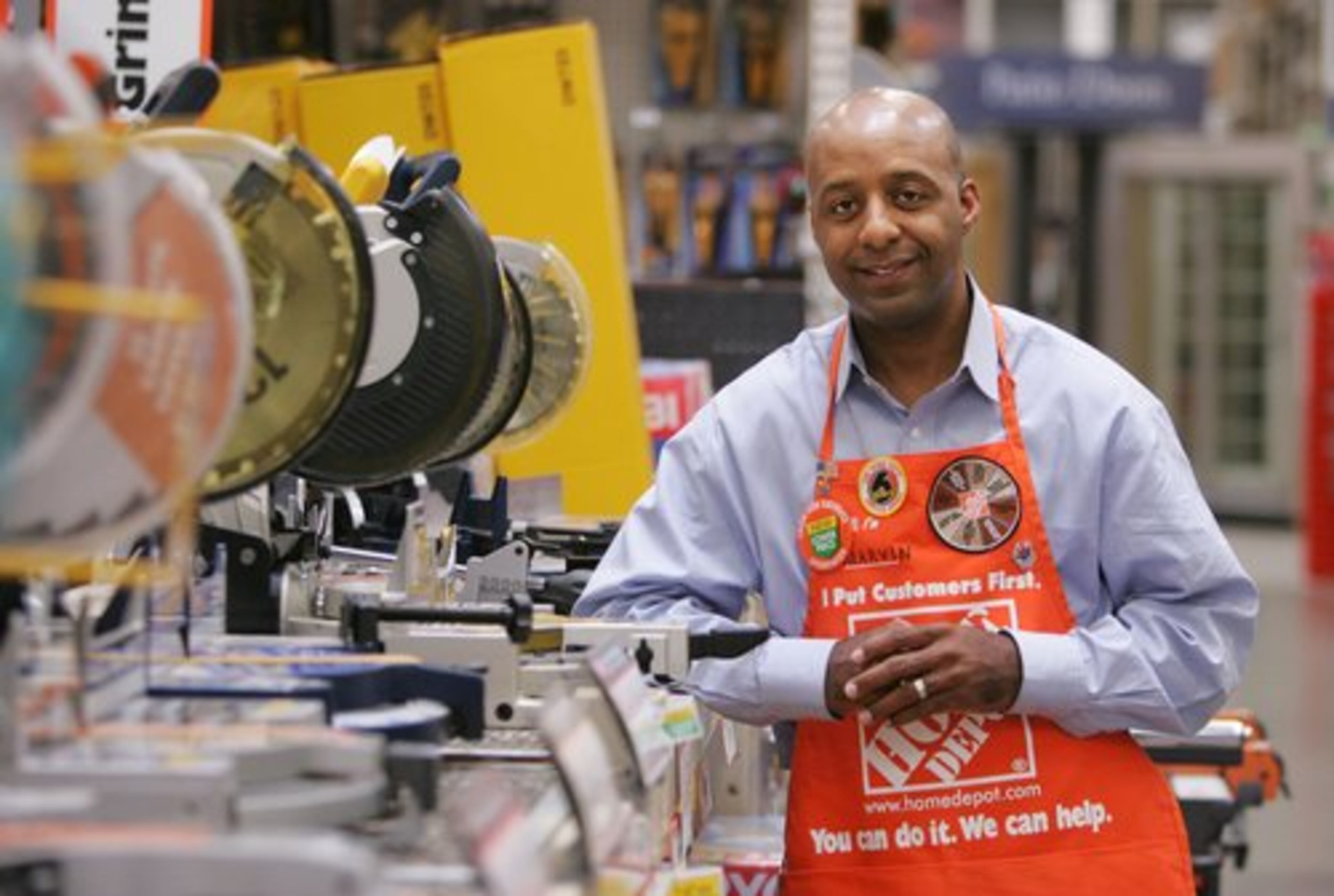 Marvin Ellison, the new executive vice president of Home Depot's U.S. stores, is pictured with some miter saws on display at the Cumberland Parkway store in Vinings.