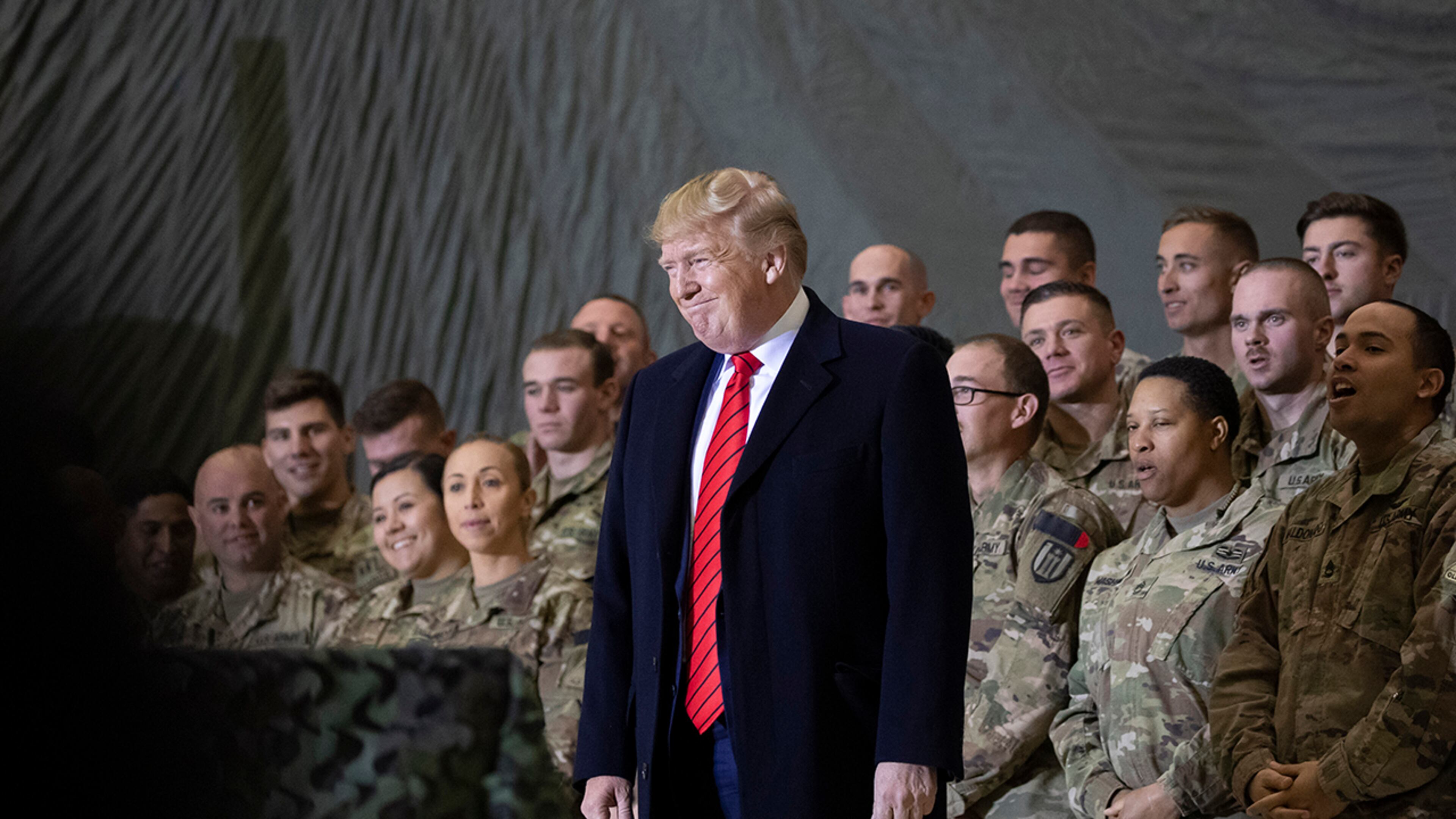 President Donald Trump smiles before addressing members of the military during a surprise Thanksgiving Day visit, Thursday, Nov. 28, 2019, at Bagram Air Field, Afghanistan. (AP Photo/Alex Brandon)