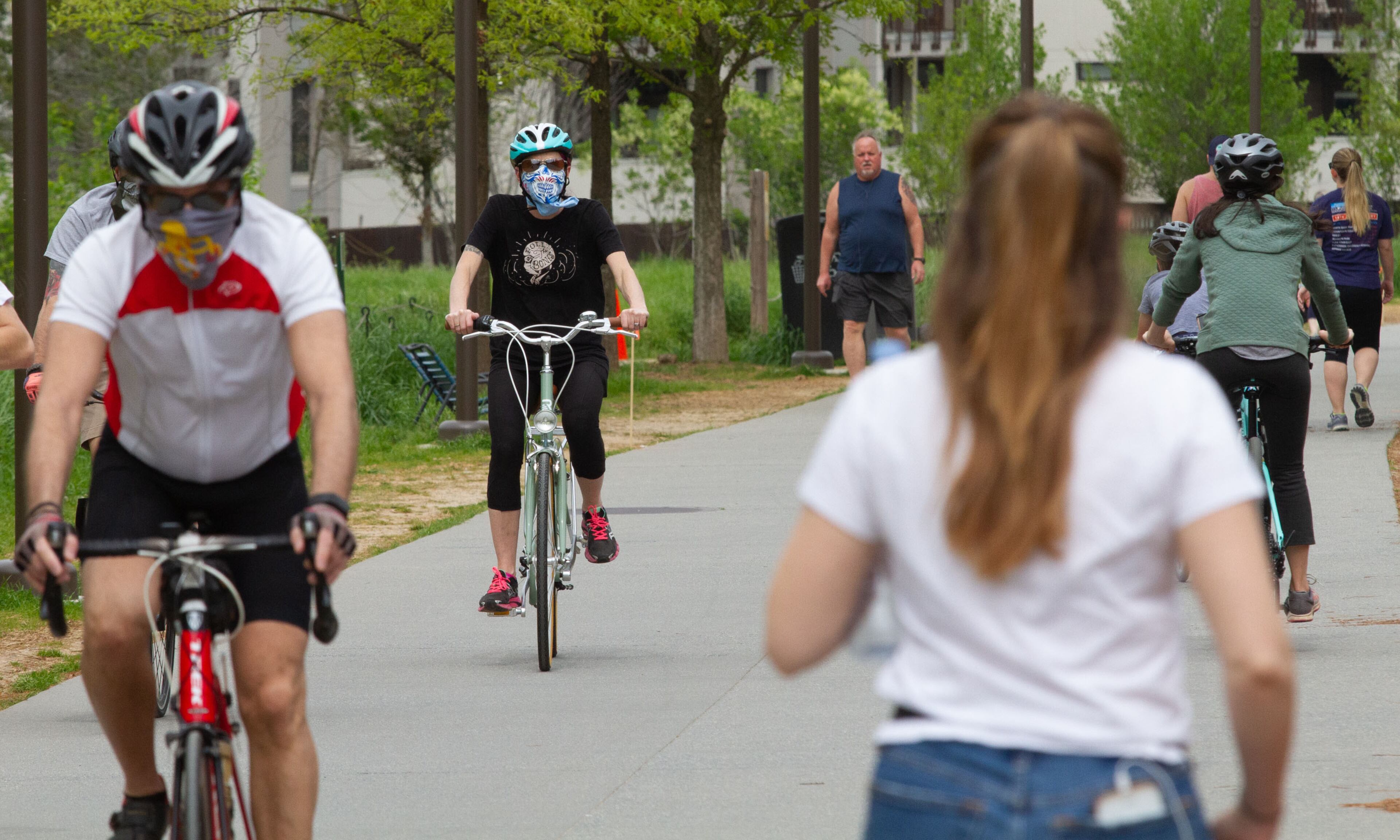 Masked and unmask people make there way along the beltline Saturday, April 4, 2020. STEVE SCHAEFER / SPECIAL TO THE AJC