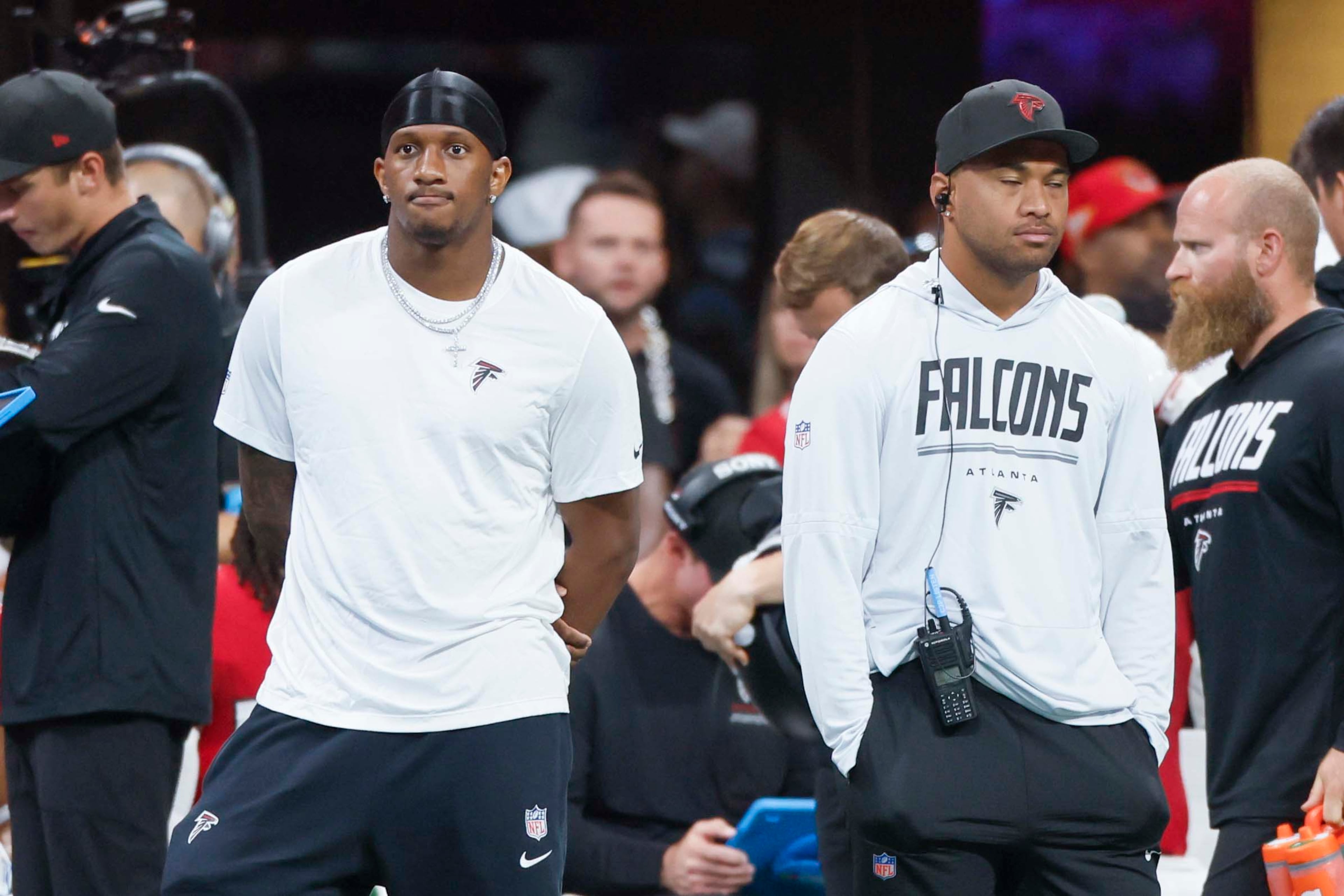 Atlanta Falcons quarterbacks Michael Penix Jr. (9) and Tua Tagovailoa (1) react from the sidelines after a play in the first half of an NFL game against the Carolina Panthers at Mercedes-Benz Stadium in Atlanta on Sunday, September 20, 2026. (Miguel Martinez/AJC)