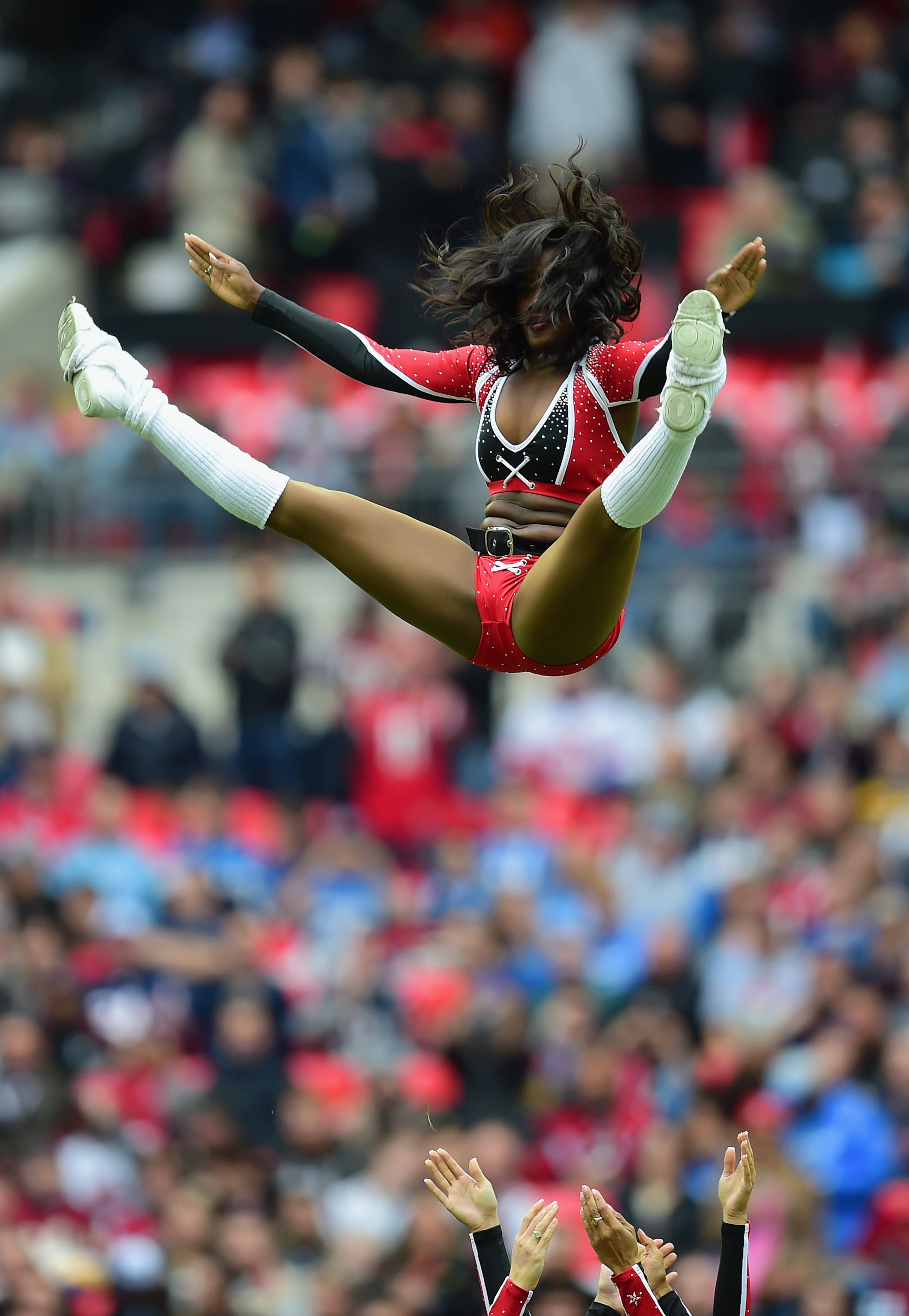 The cheerleaders perform during the NFL match between Detroit Lions and Atlanta Falcons at Wembley Stadium on October 26, 2014 in London, England. (Photo by Jamie McDonald/Getty Images)