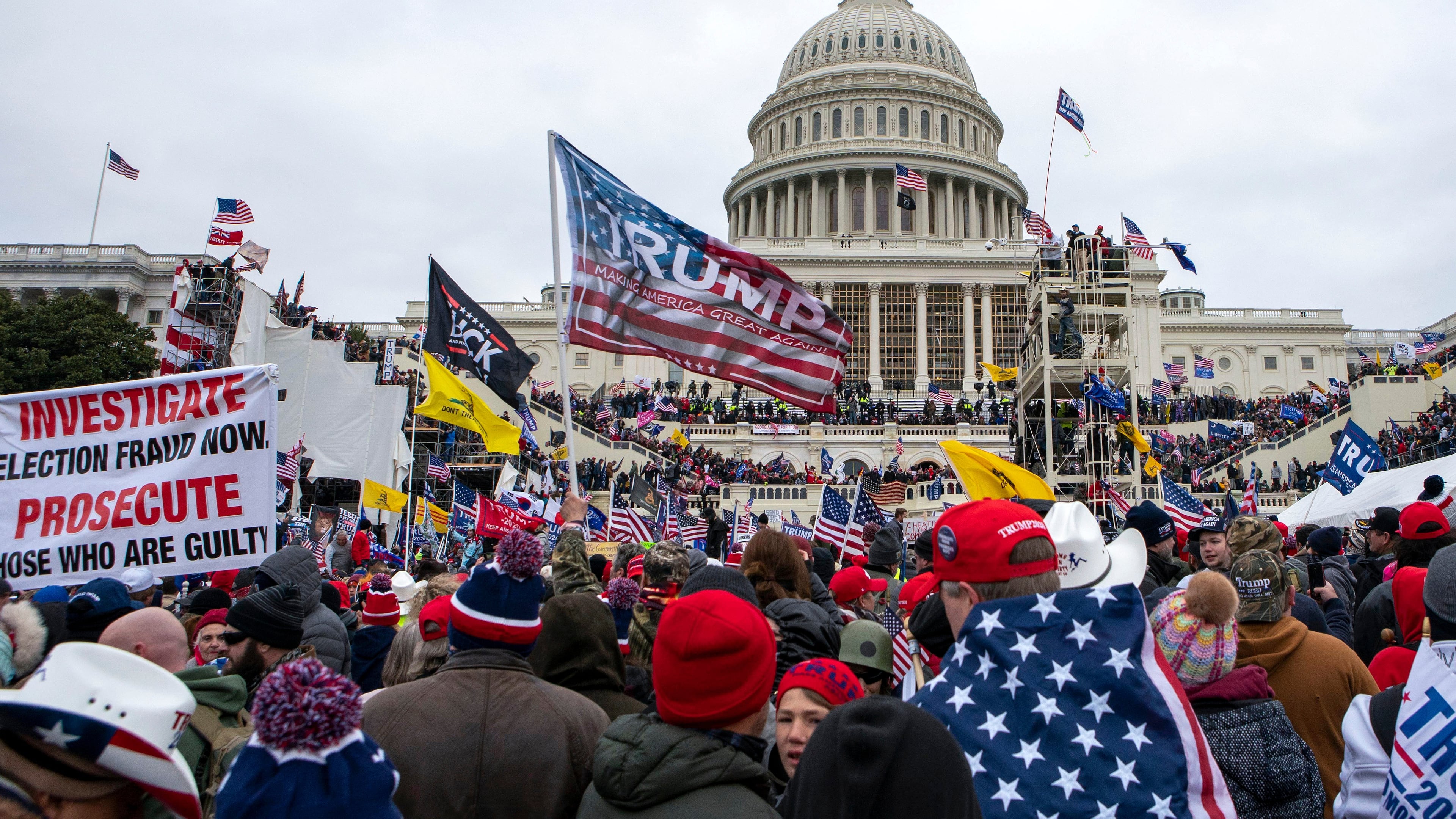 FILE - Rioters loyal to President Donald Trump rally at the U.S. Capitol in Washington, Jan. 6, 2021. (AP Photo/Jose Luis Magana, File)