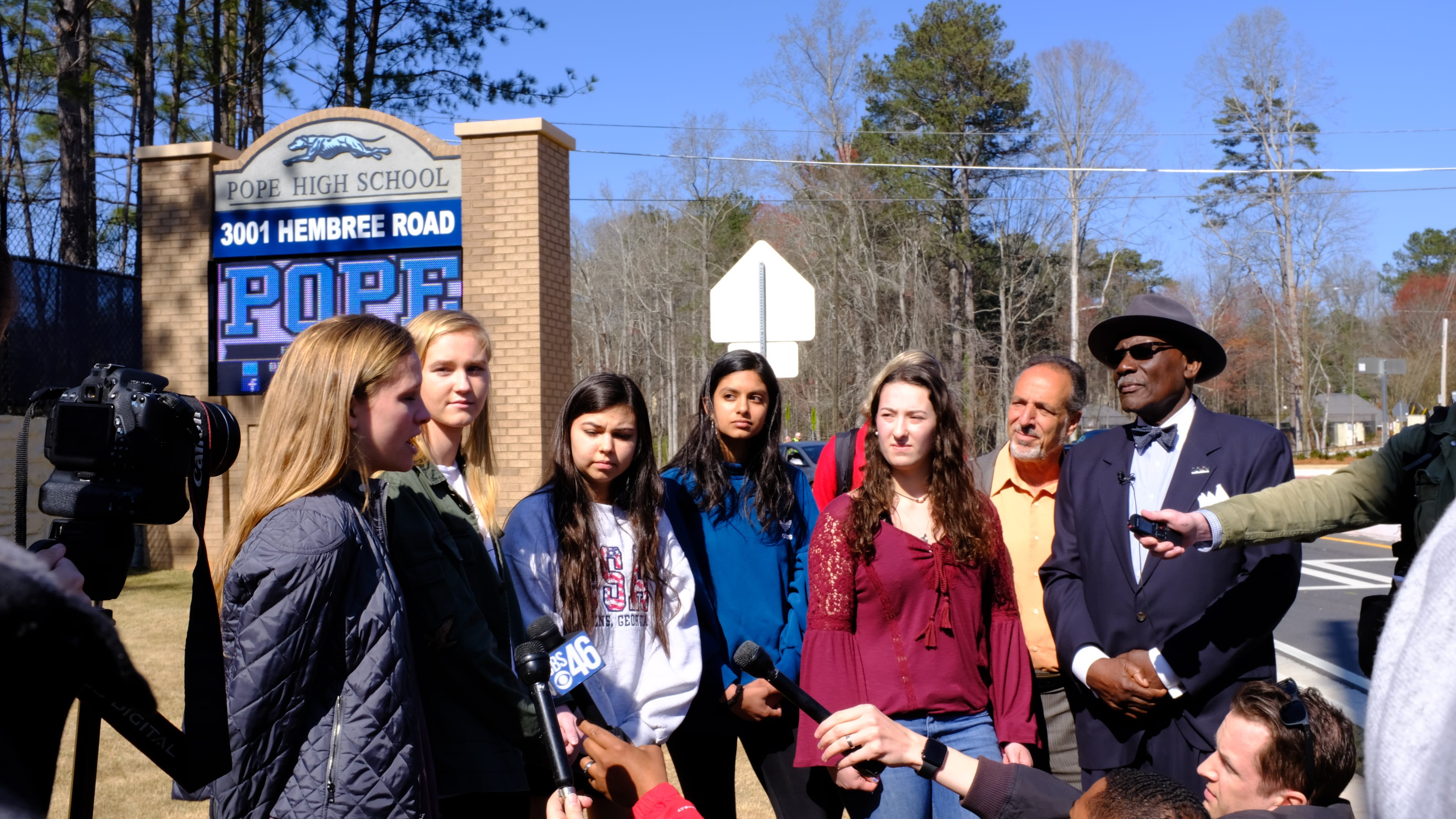 Pope High School students who are organizing a walkout Wednesday as part of a nationwide protest against gun violence held a news conference outside their school Tuesday to discuss the response from Cobb County School District. The students said school officials have provided changing and contradictory information about what discipline students will face if they walkout.