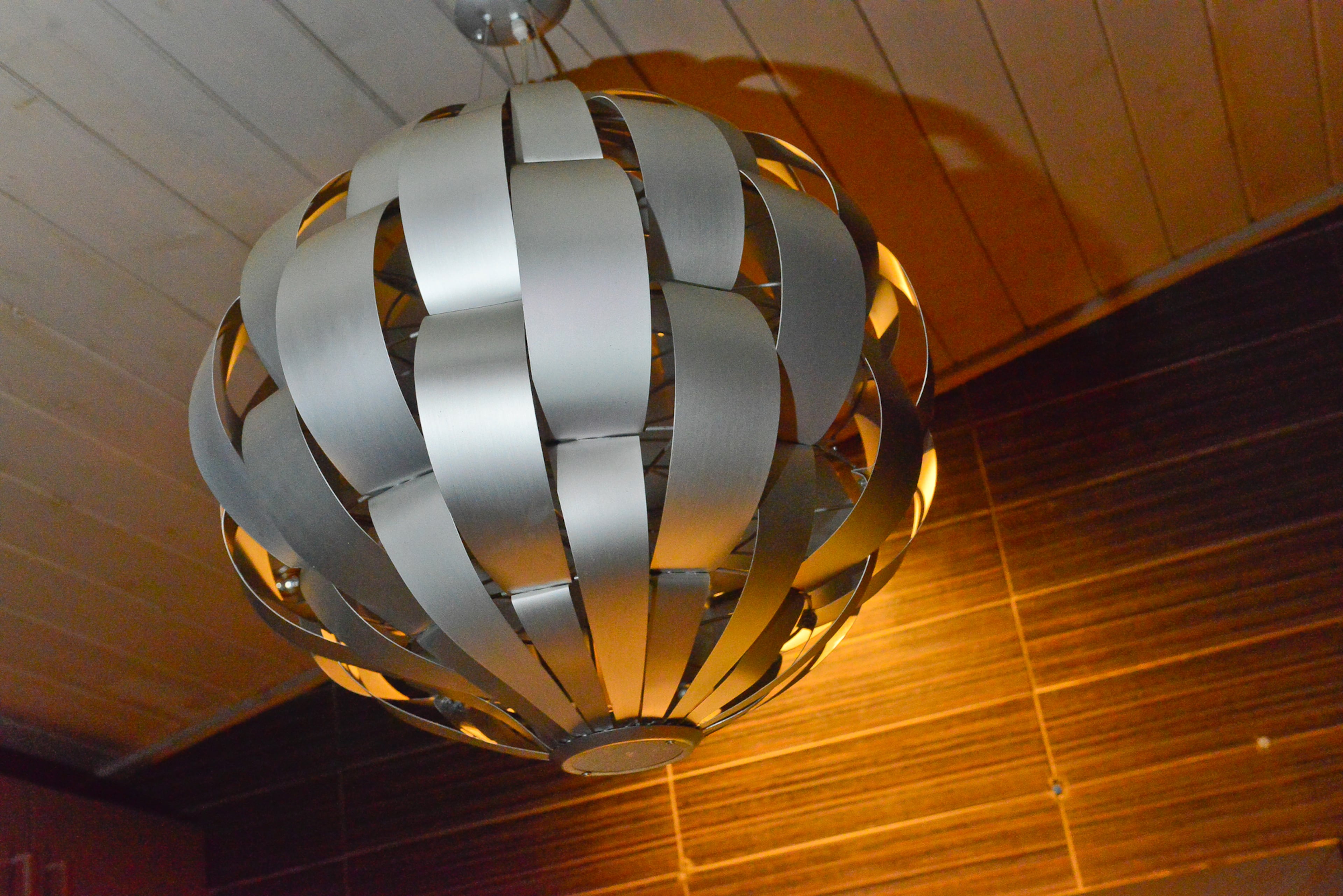 Another feature that came with the home was many of the light fixtures. Each one is different, and Madeira especially likes the use of big shapes, such as the fixture in her kitchen.