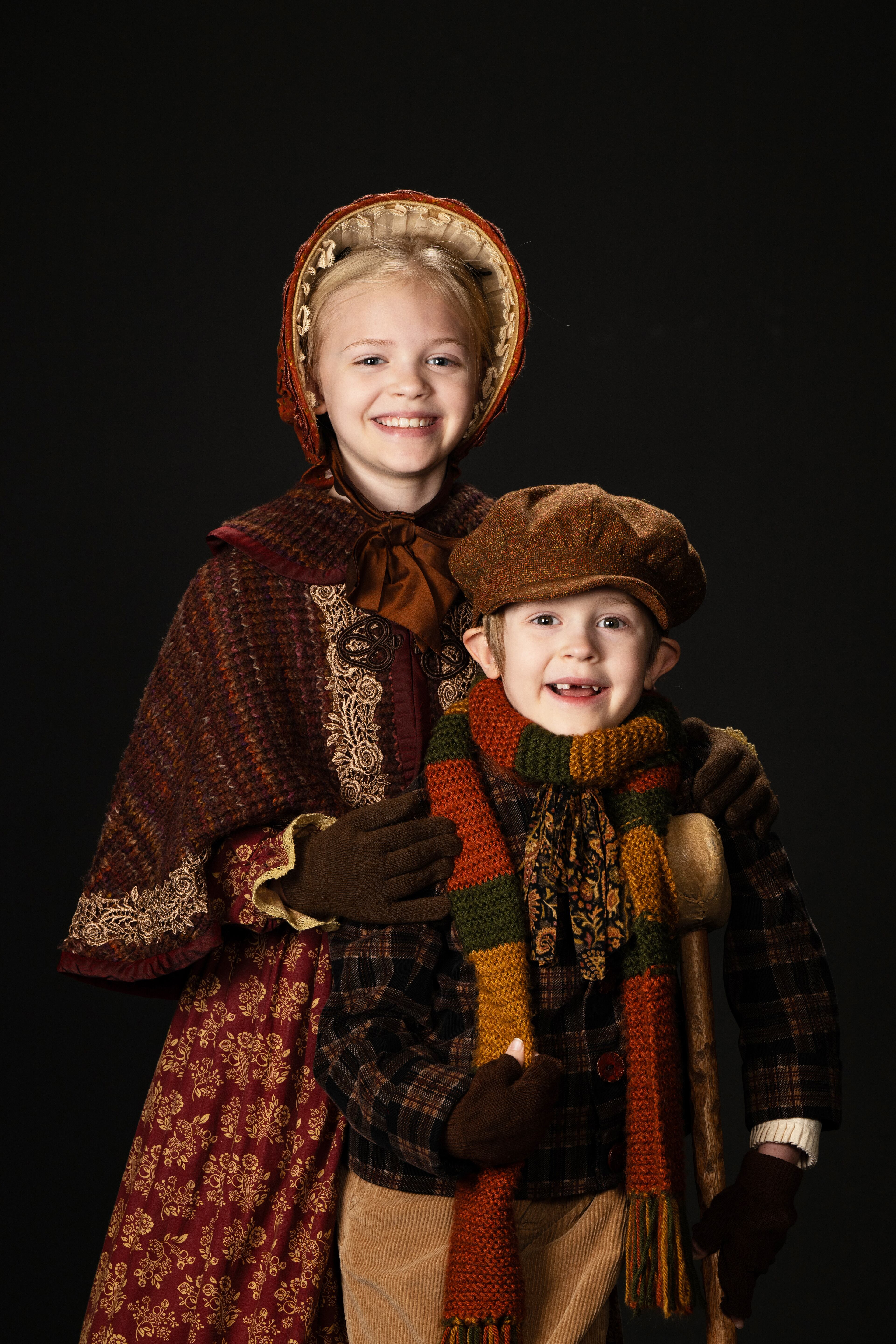 Emberlynn Wood, 9, plays Emma Cratchit, and her brother Cullen, 5, makes his debut as Tiny Tim in Dickens’ “A Christmas Carol” at the Alliance Theatre. Emberlynn also will double as Fred, Scrooge’s nephew, as a child.