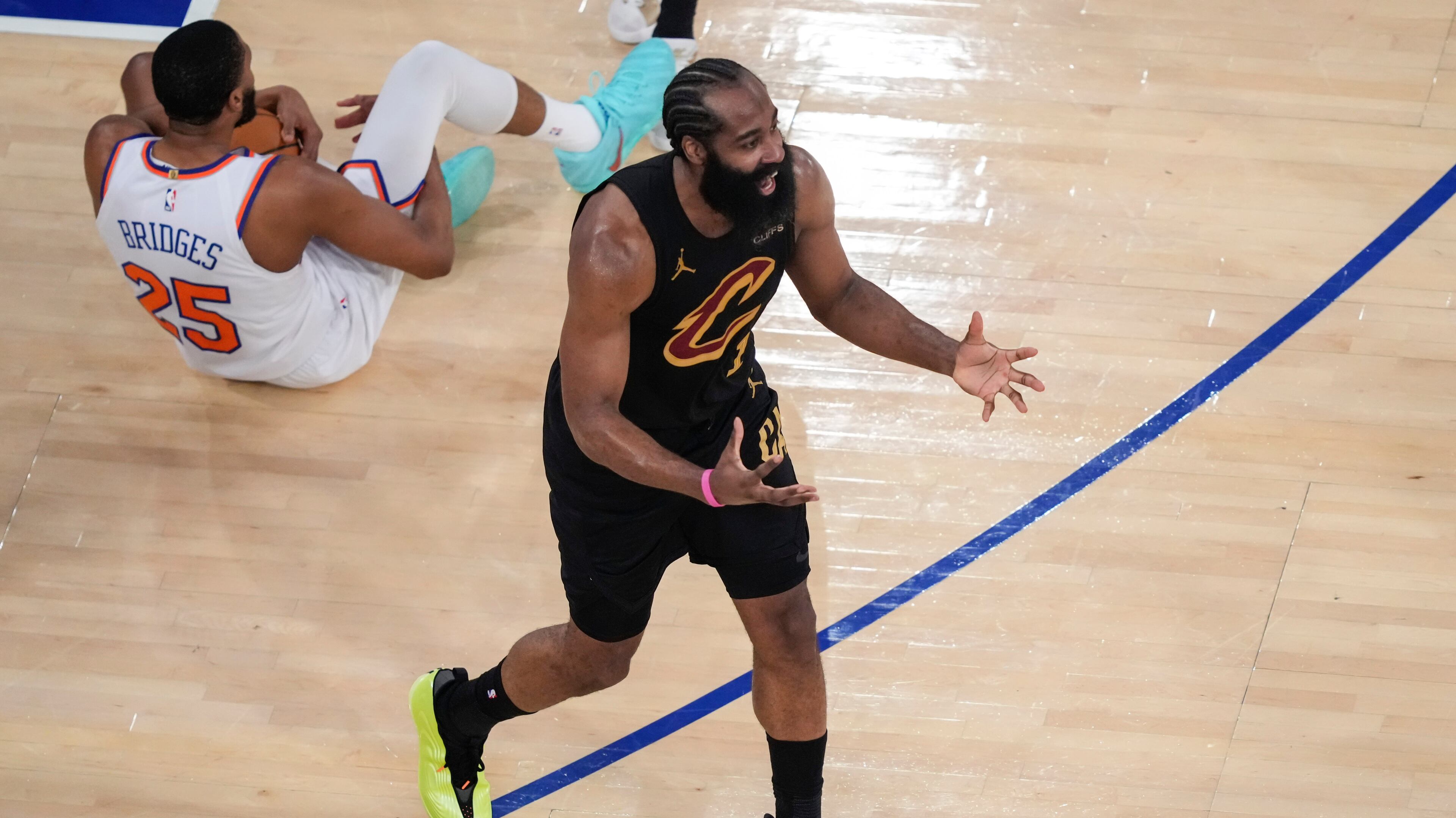 Cleveland Cavaliers guard James Harden (1) reacts after giving a foul to New York Knicks guard Mikal Bridges (25) during the second half of Game 1 in the Eastern Conference finals NBA basketball playoffs series Tuesday, May 19, 2026, in New York. (AP Photo/Yuki Iwamura)
