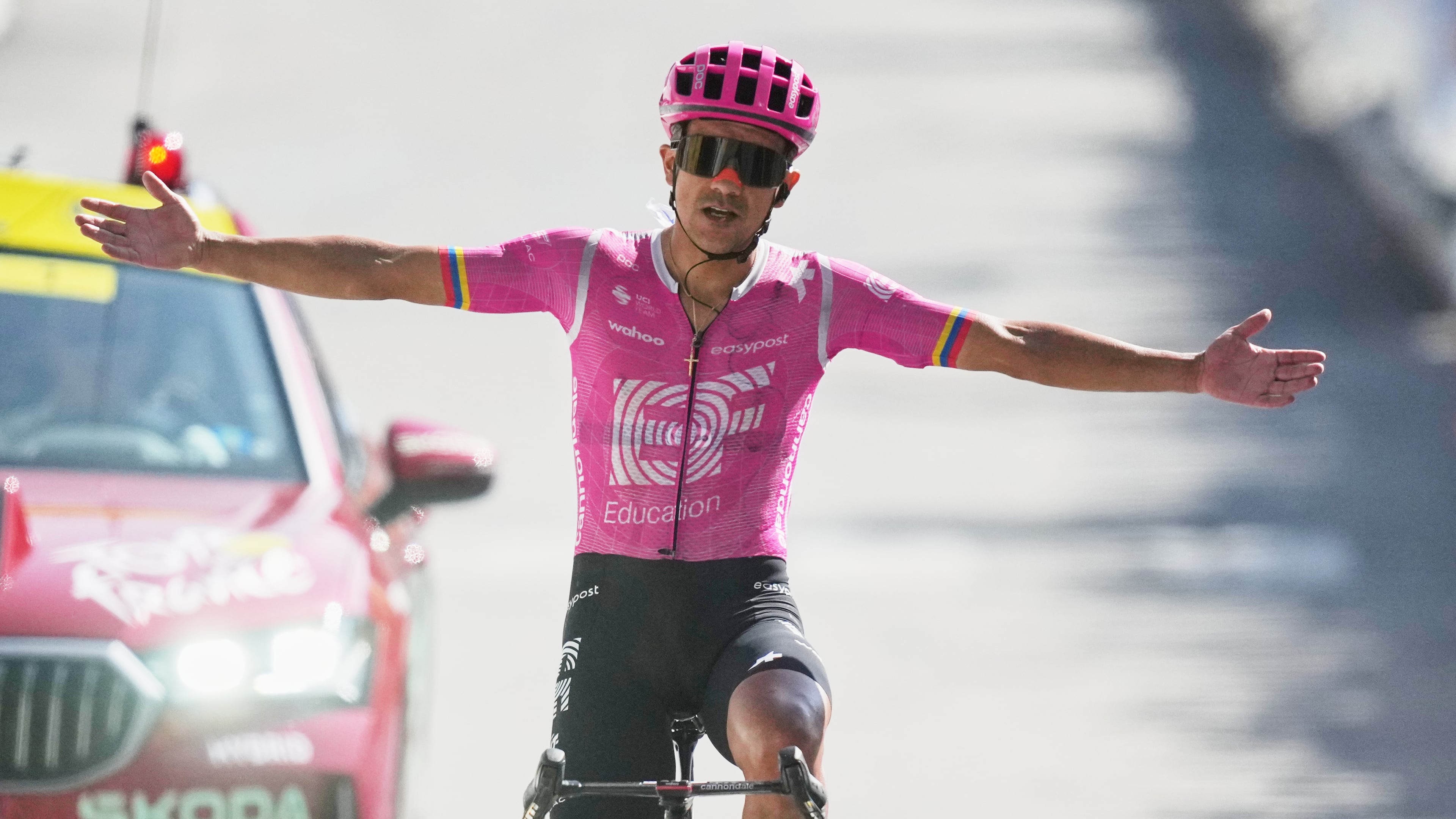 Ecuador's Richard Carapaz celebrates as he crosses the finish line to win the eighteenth stage of the Tour de France cycling race, with start in Voiron and finish in Orcieres-Merlette, France, Thursday, July 23, 2026. (AP Photo/Mosa'ab Elshamy)