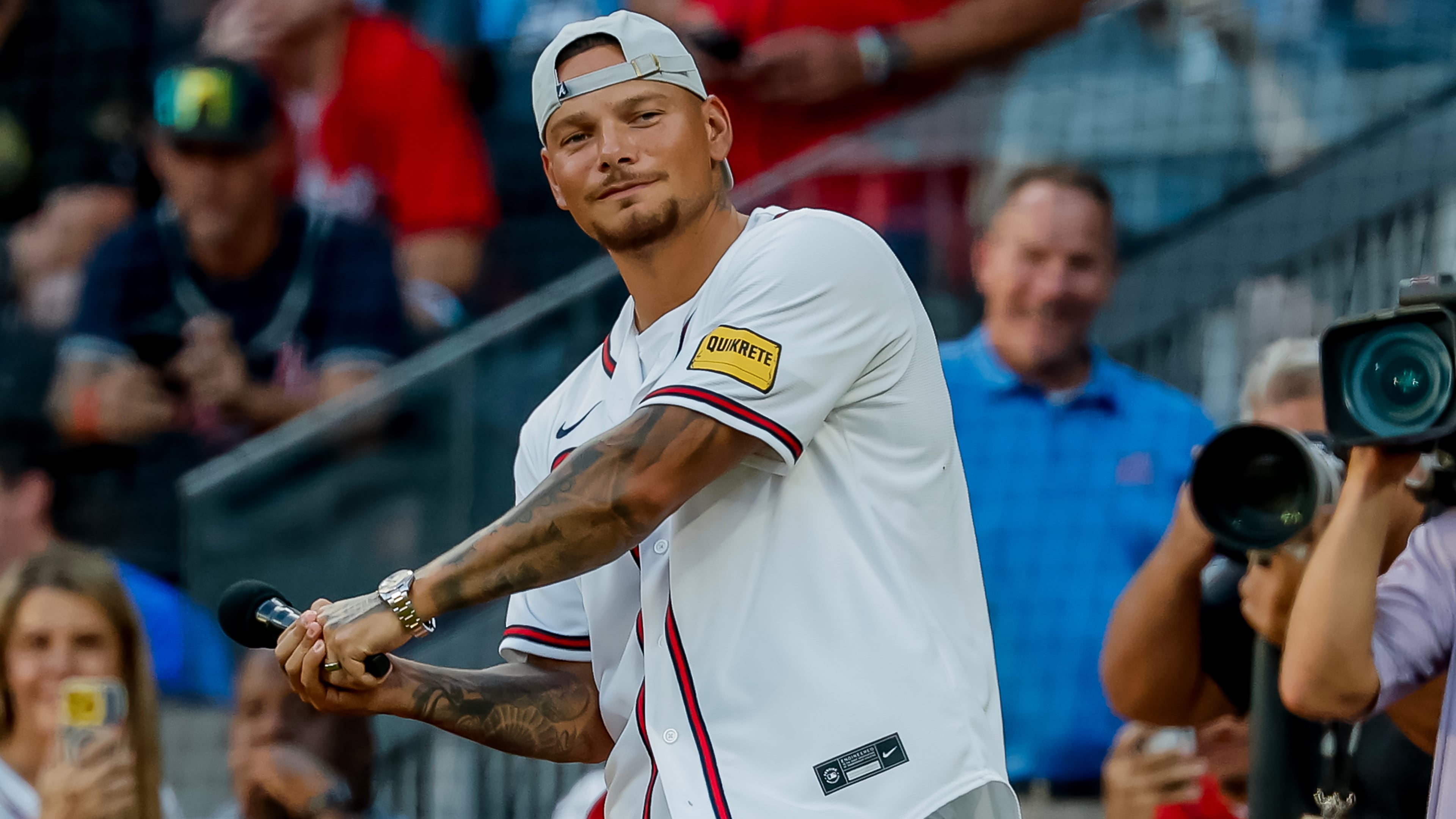 Country music singer Kane Brown gestures before reciting "Play Ball" before the Atlanta Braves hosted the Tampa Bay Rays on Wednesday, Sept. 9, 2026. (Erik S. Lesser/AP)