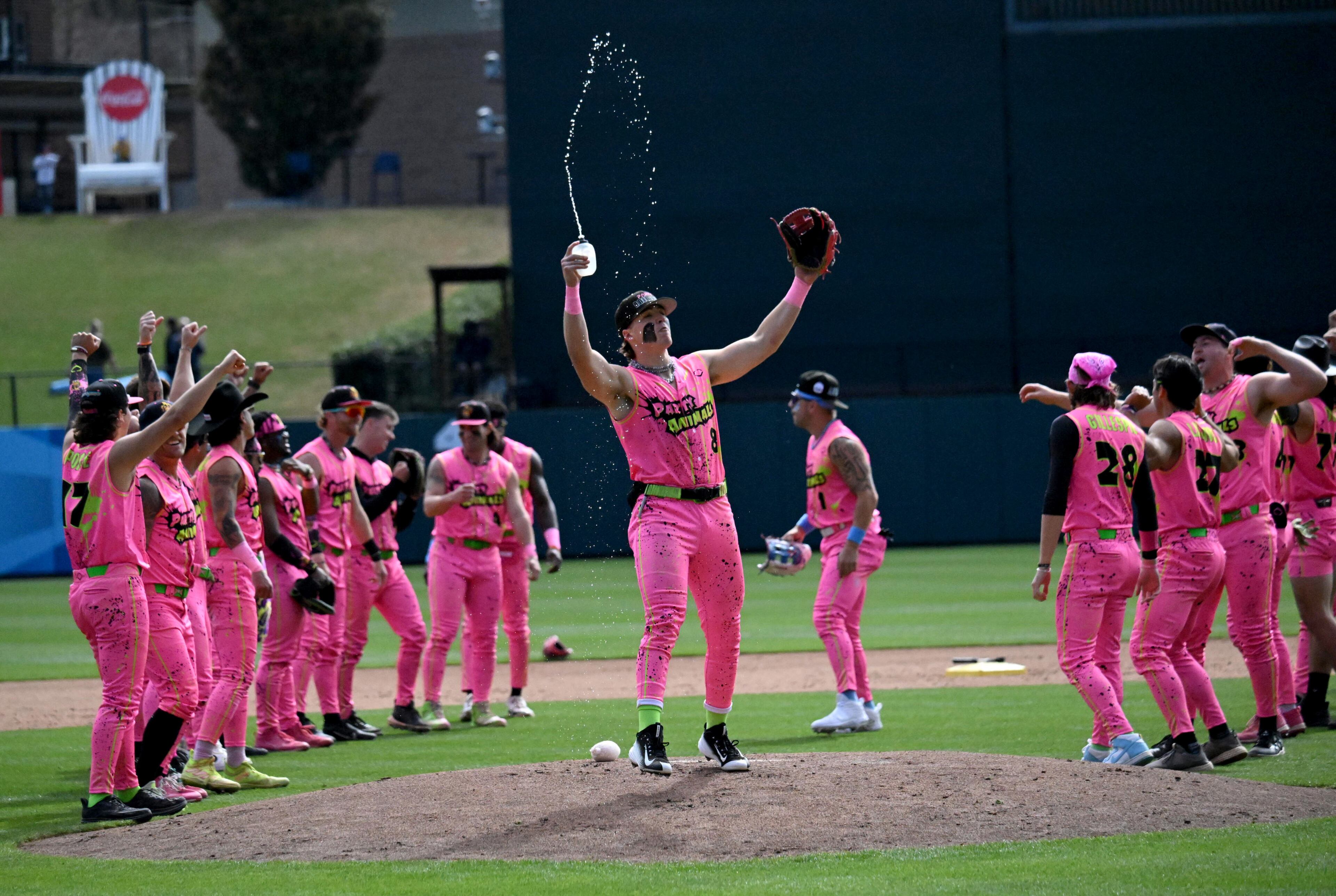 Party Animals players entertain fans during pregame festivities. (Hyosub Shin / Hyosub.Shin@ajc.com)