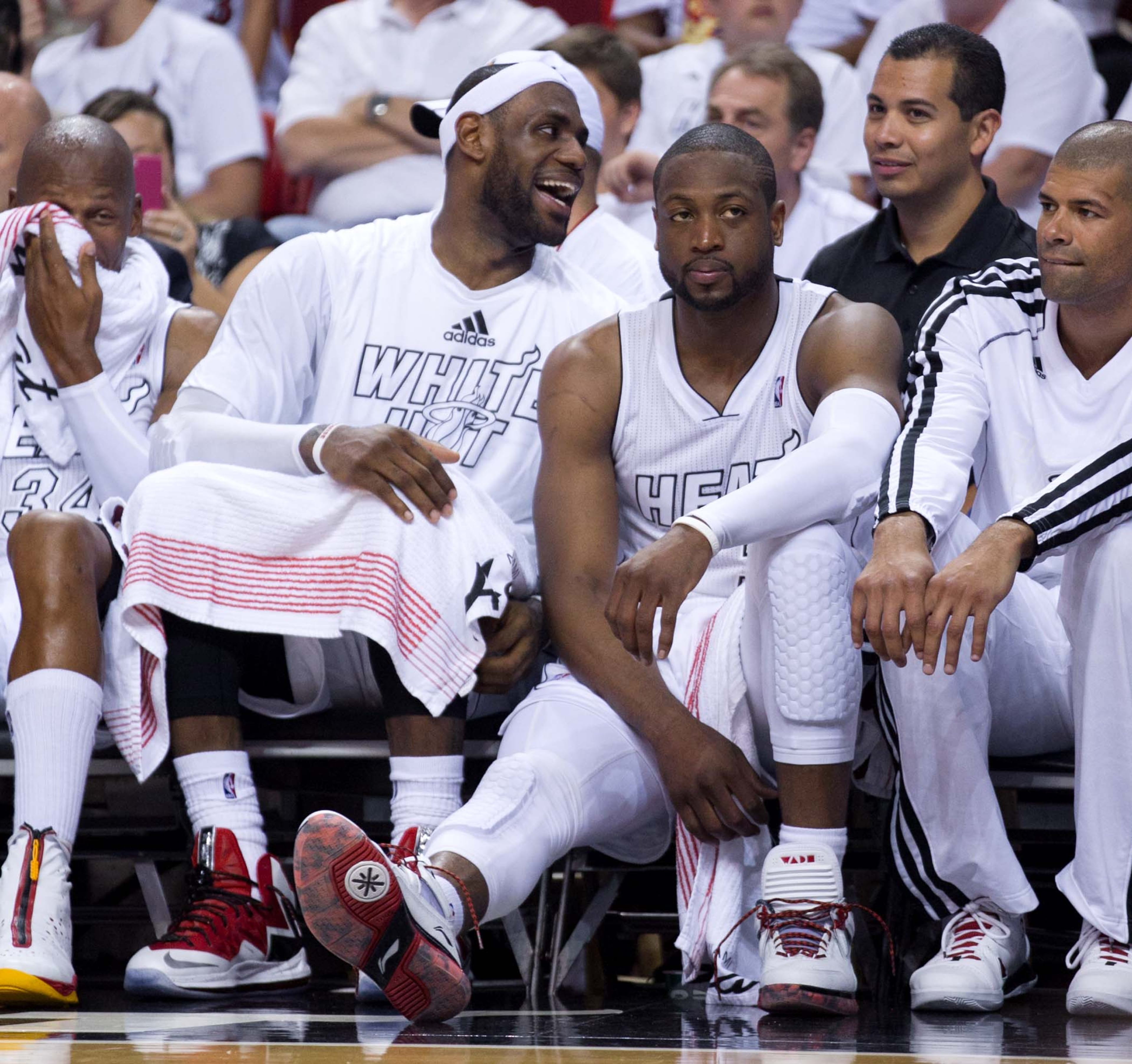 Miami Heat small forward LeBron James (6) and Miami Heat shooting guard Dwyane Wade (3) watch the final minutes of the game from the bench against the Bucks at AmericanAirlines Arena on April 21, 2013. (Allen Eyestone/The Palm Beach Post)